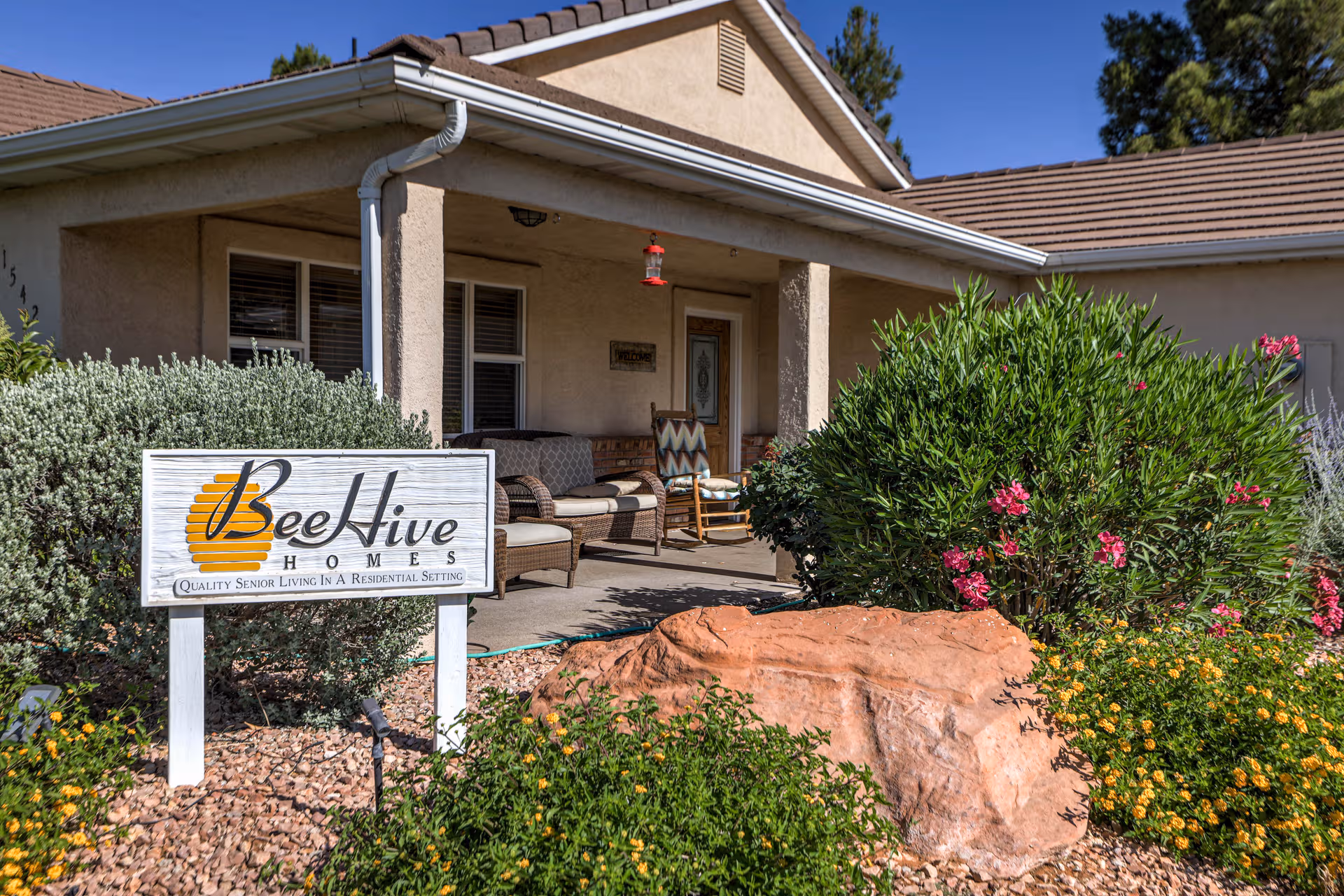 Front porch of Beehive Homes of St George - Snow Canyon with outdoor seating.