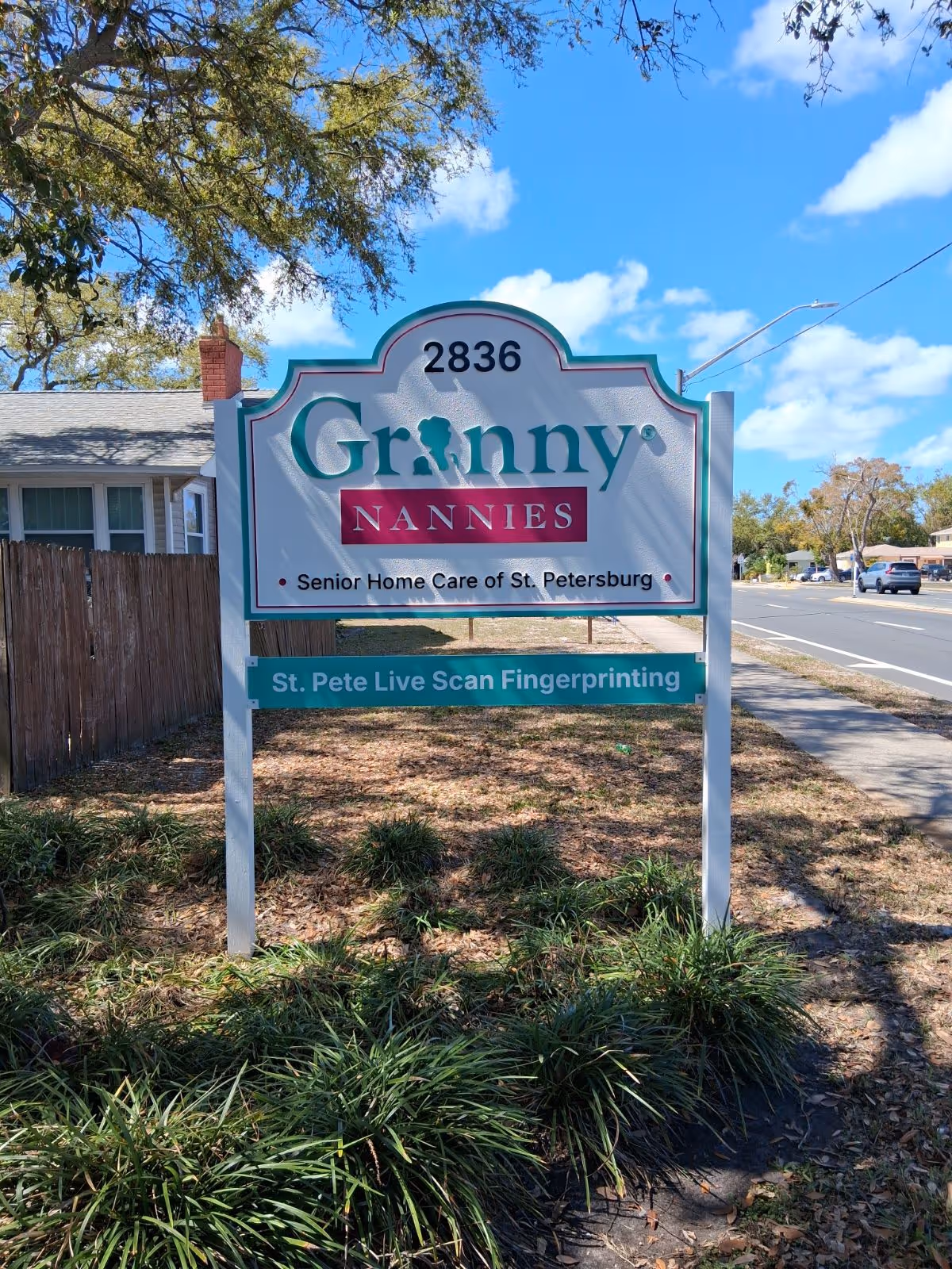 This image shows a roadside sign for Granny Nannies Senior Home Care of St. Petersburg.