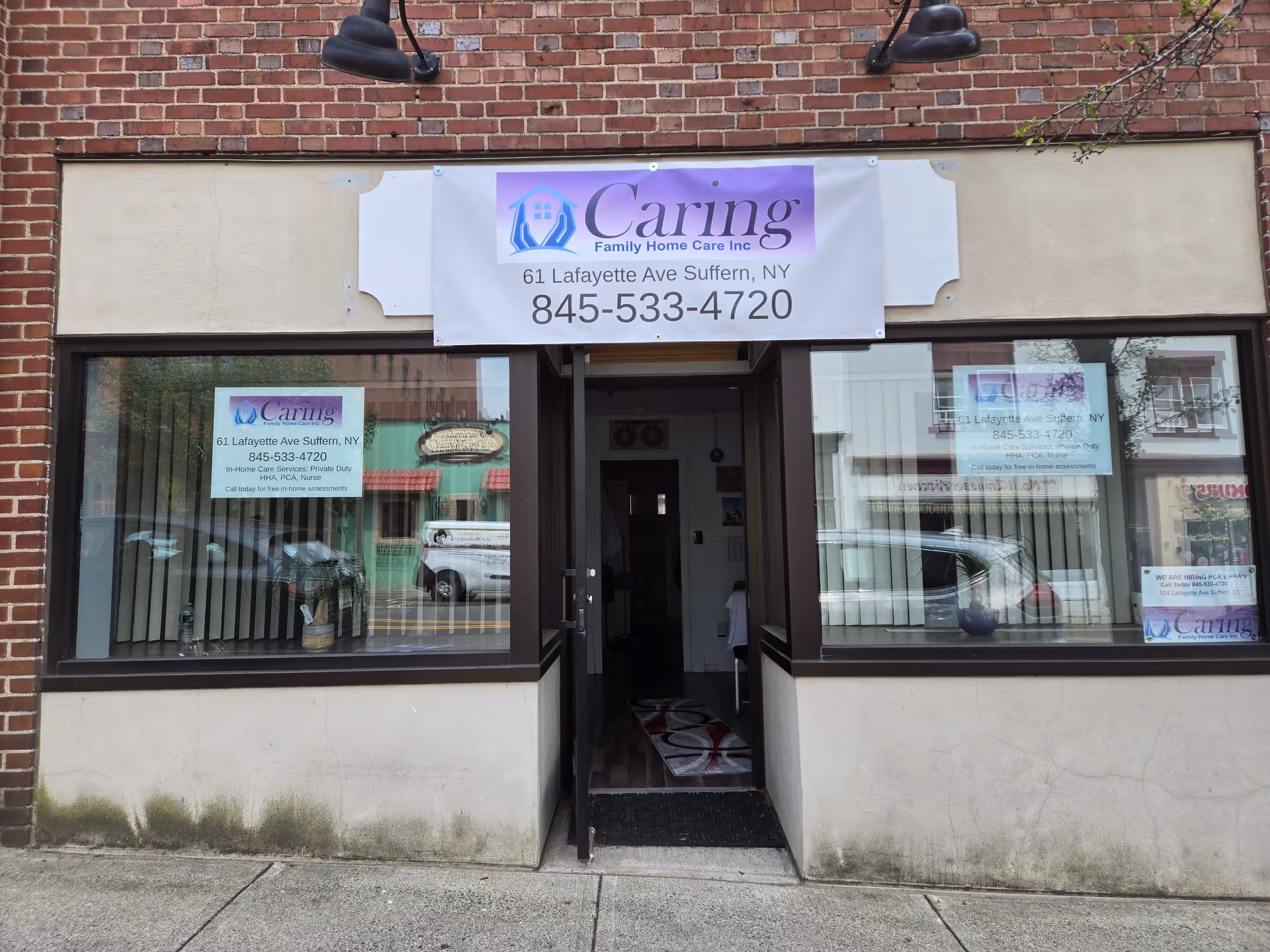 The storefront shows Caring Family Home Care Inc with a banner above the entrance.