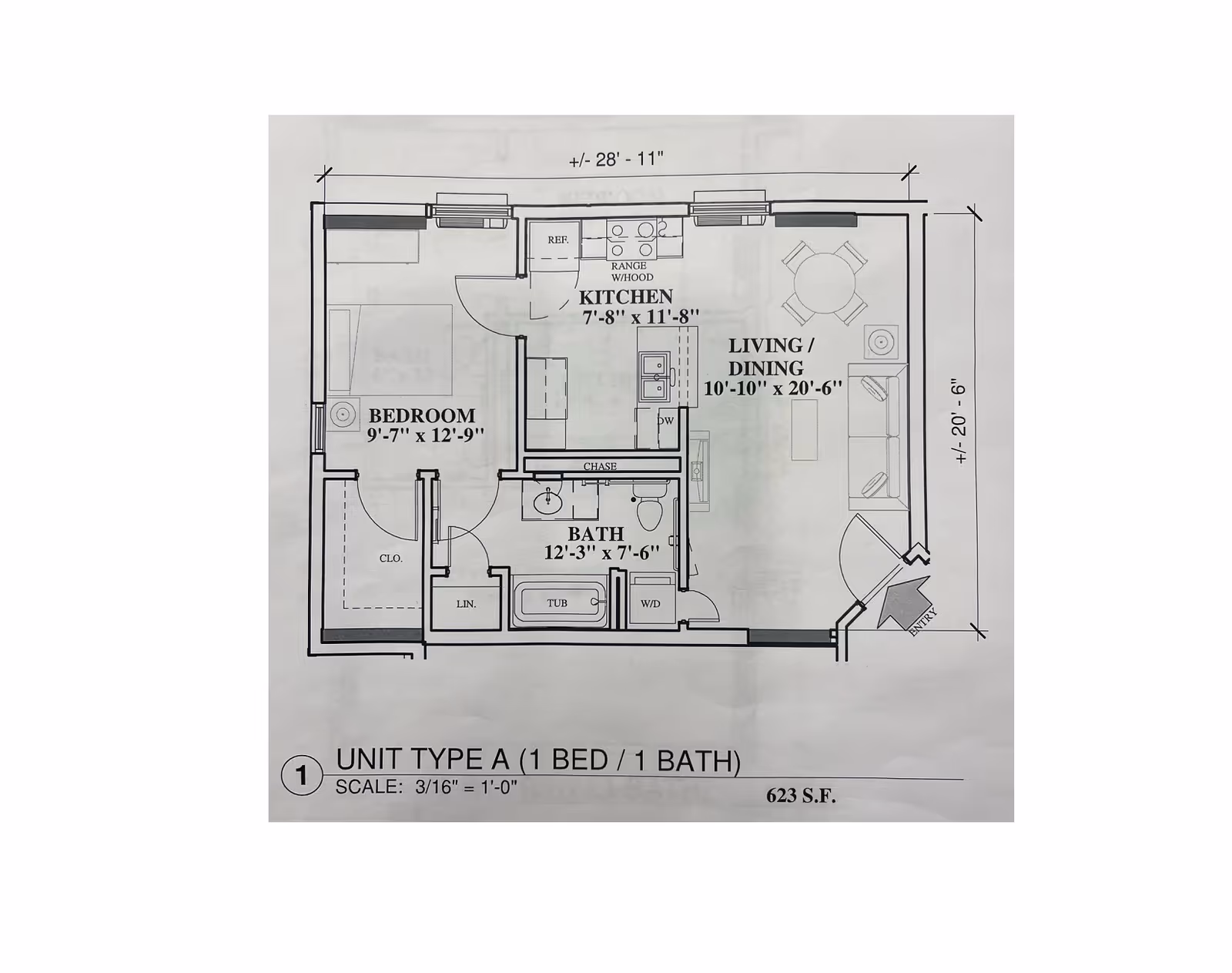 Floor plan of a one-bedroom unit with kitchen, living area, and bath.