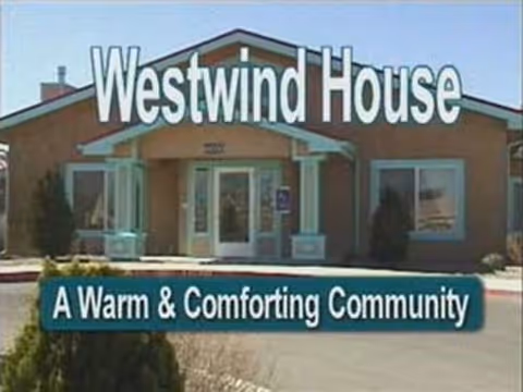 Front exterior of Westwind House Assisted Living with the entrance and welcoming sign.