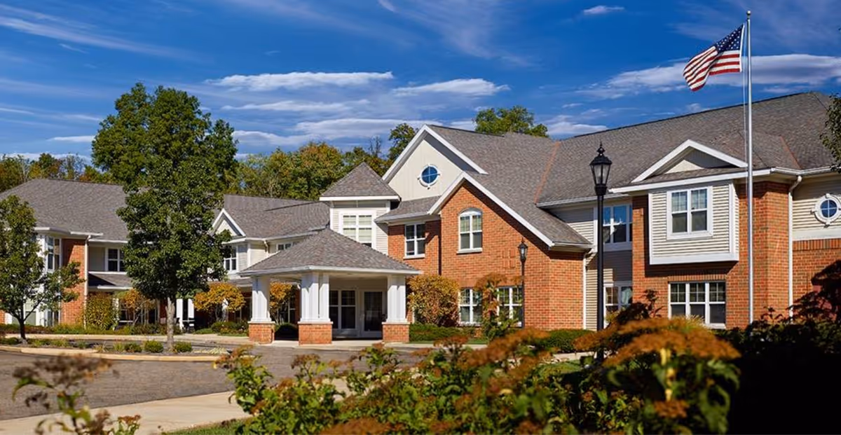 Exterior view of Eliza At Chagrin Falls senior living facility entrance.