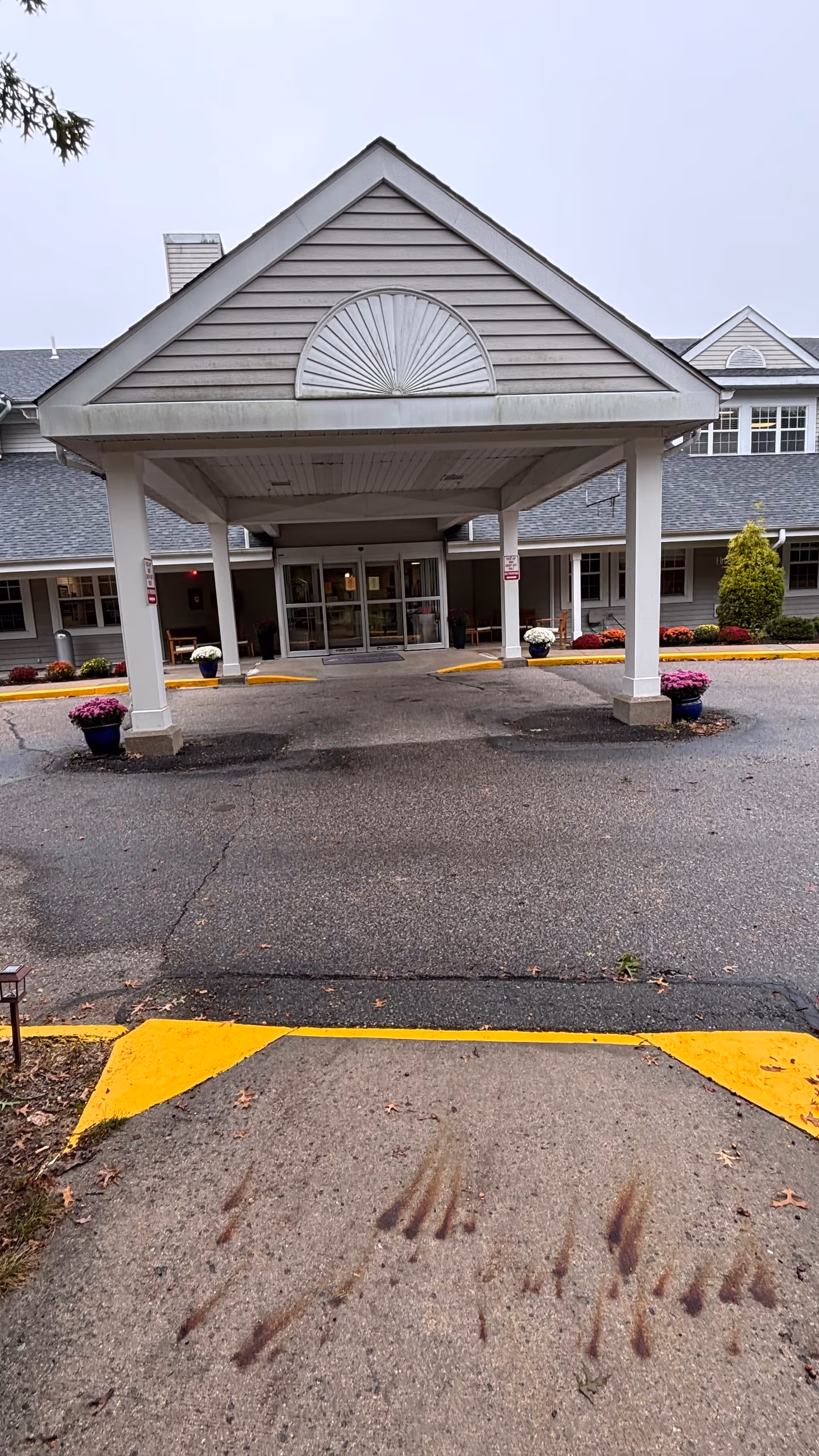 Exterior view of Pendleton Health and Rehabilitation Center front entrance under a porte-cochère.