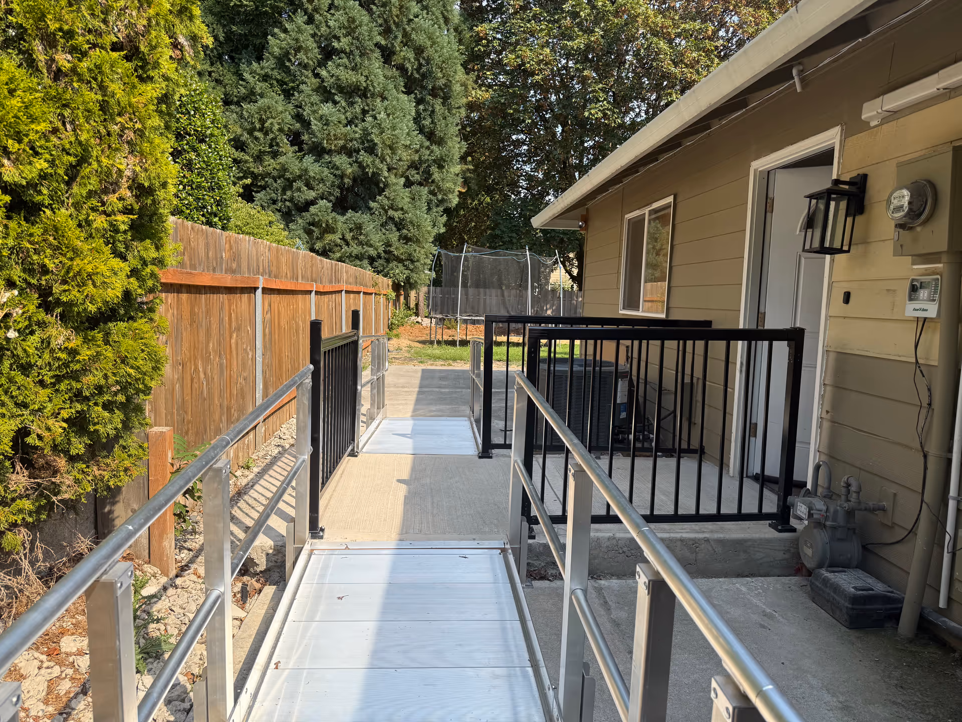 Exterior view of Bethlehem adult family home with a long ramp beside the building.
