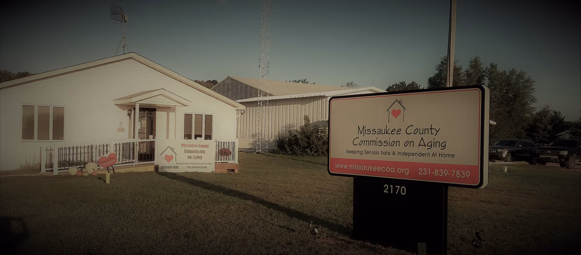 White, single-story building with a large Missaukee County Commission on Aging sign out front.