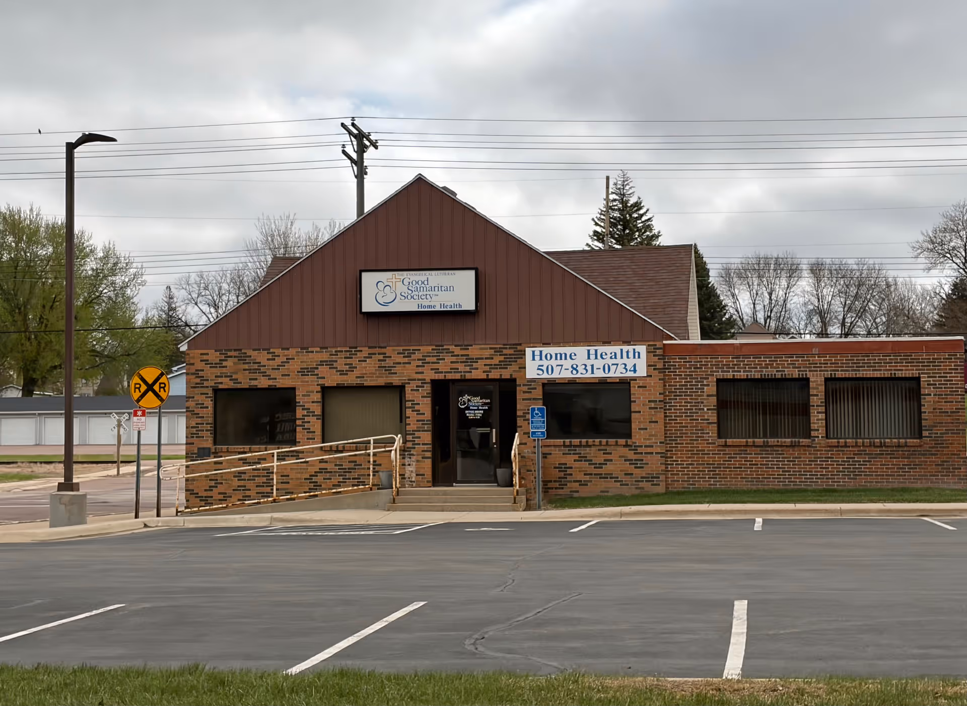 Brick Good Samaritan Society building with Home Health sign and accessible entrance.
