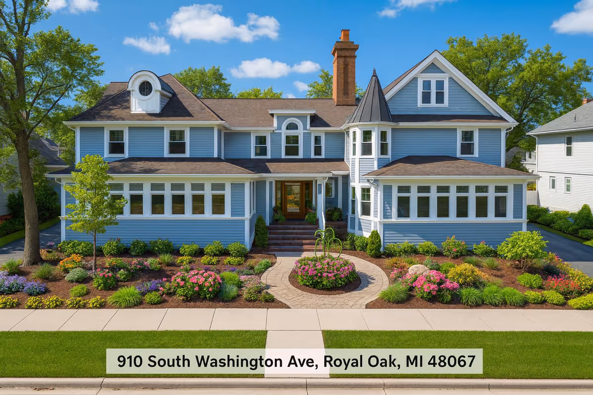 Two-story blue building resembling a senior living center with landscaped front yard and walkway