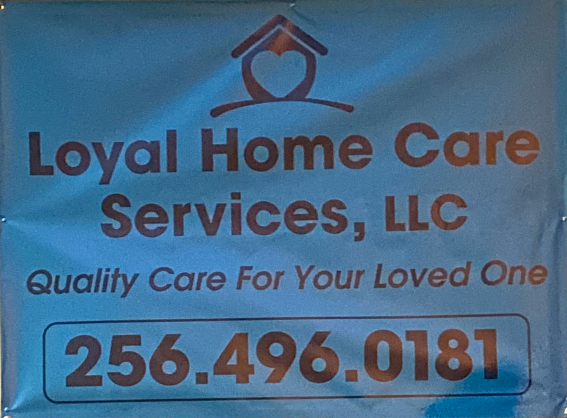 Blue banner displaying Loyal Home Care Services, LLC logo and phone number 256.496.0181.