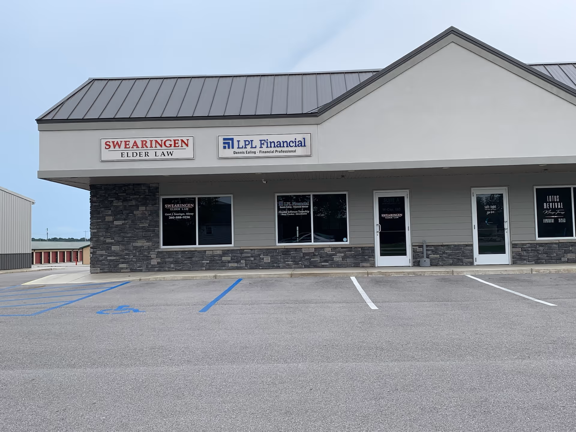 Front exterior of a single-story storefront building with Swearingen Elder Law and LPL Financial signs.