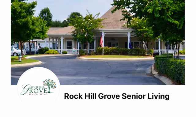 Exterior view of Rock Hill Grove Senior Living building with driveway, trees, and entrance