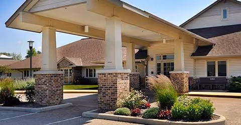 Alden Estates of Jefferson exterior with a covered entrance and brick columns.