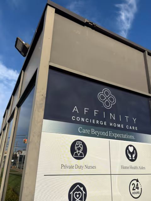 Exterior view of a building with an Affinity Home Care sign and service logos.