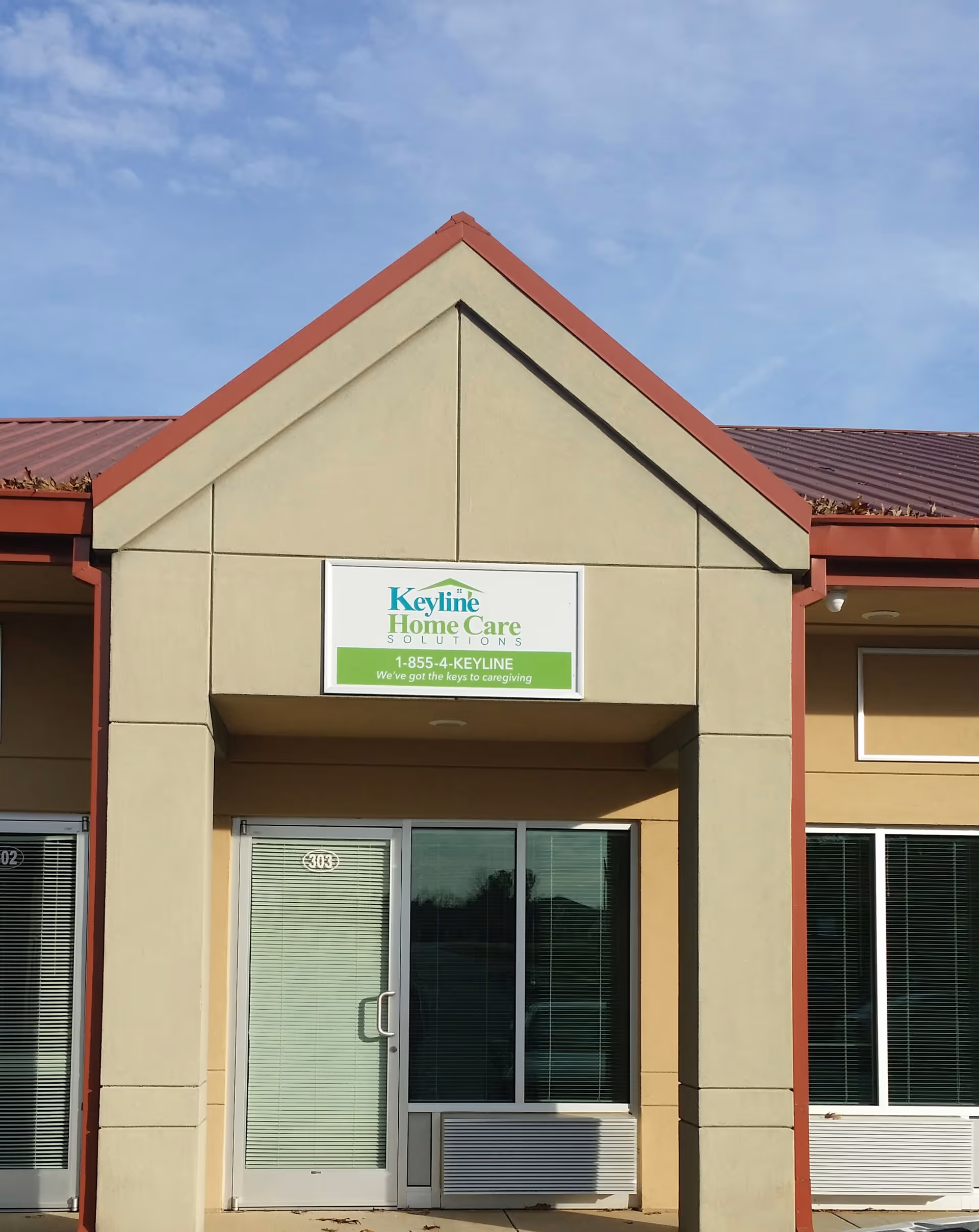 Exterior view of Keyline Home Care Solutions facility entrance with sign.
