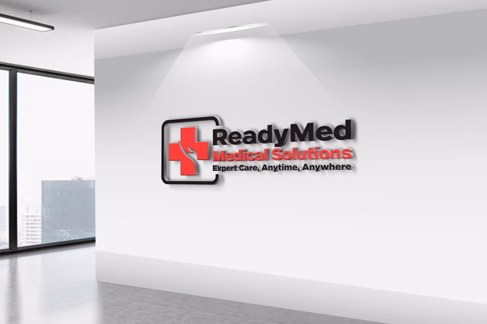 Bright modern interior lobby featuring a wall-mounted ReadyMed Medical Solutions logo.