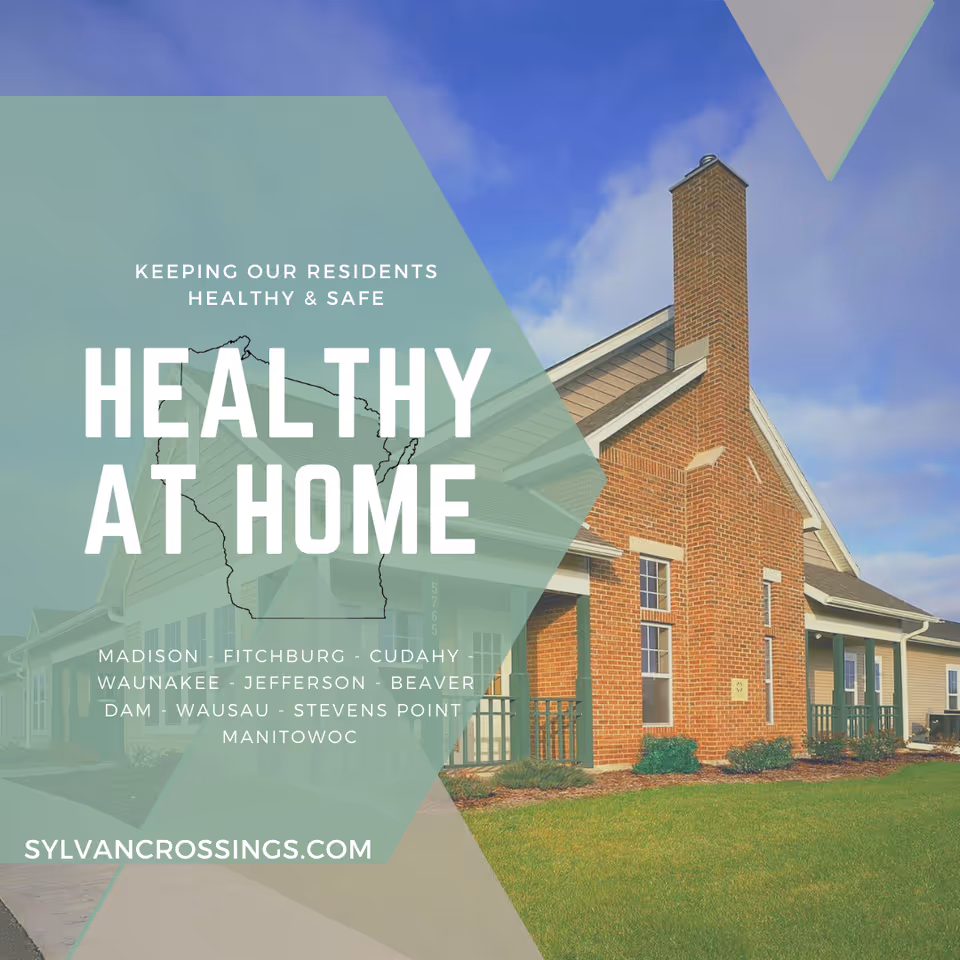 Brick building exterior with green geometric overlays and a blue sky.