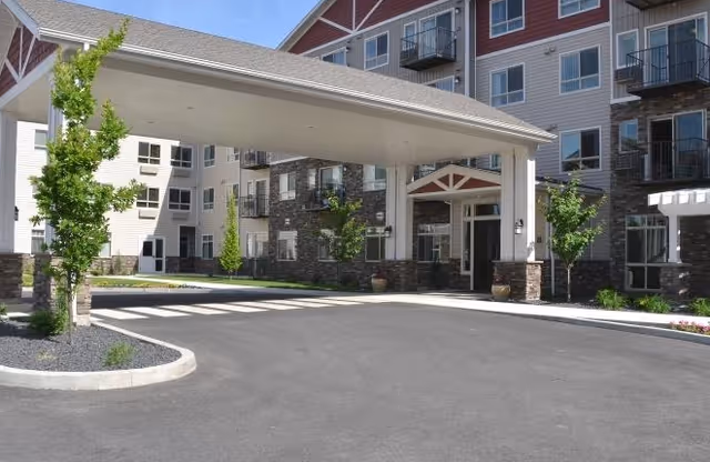 Affinity at Coeur d'Alene senior living building exterior with covered entrance canopy.