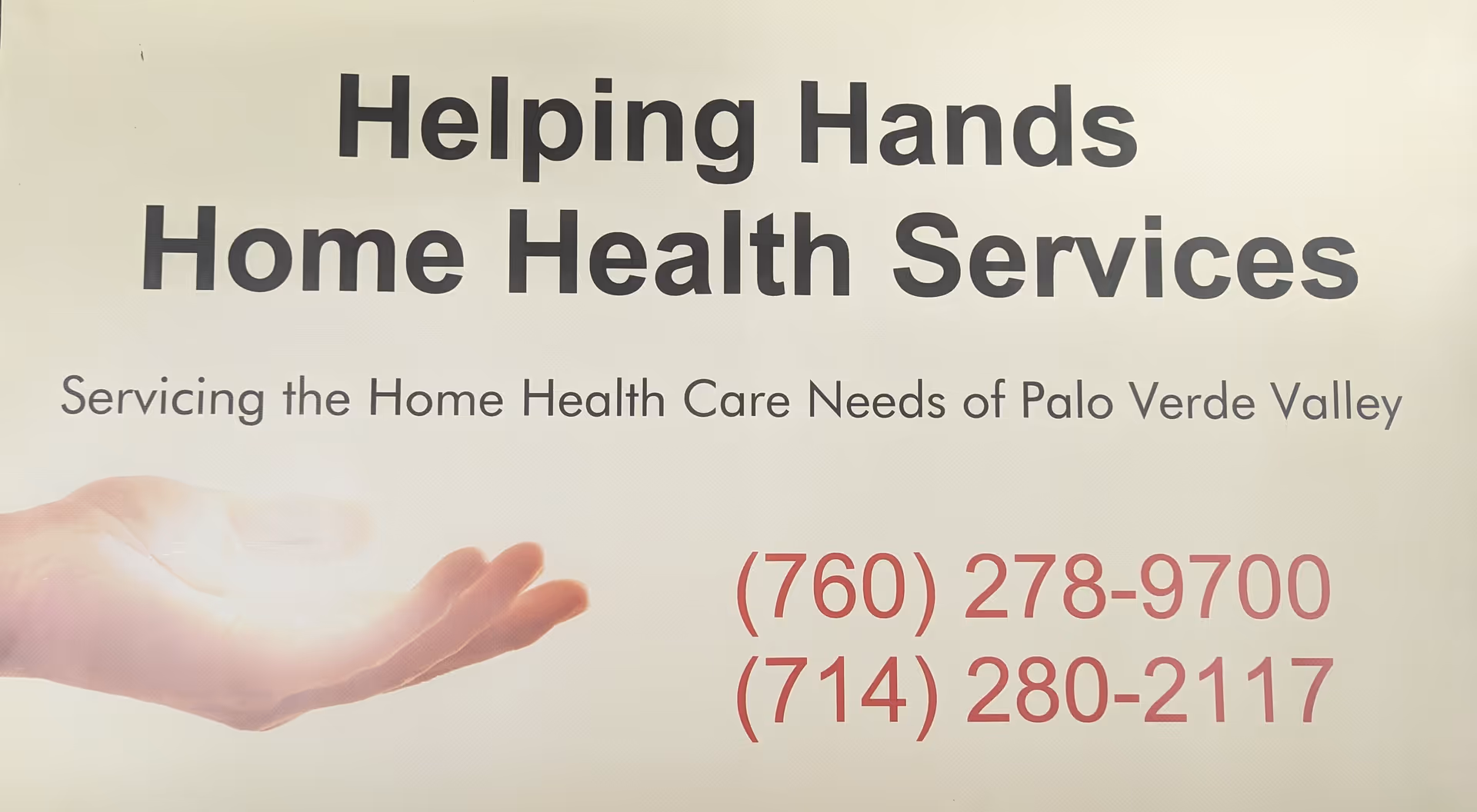 Sign reading Helping Hands Home Health Services with phone numbers and a hand graphic