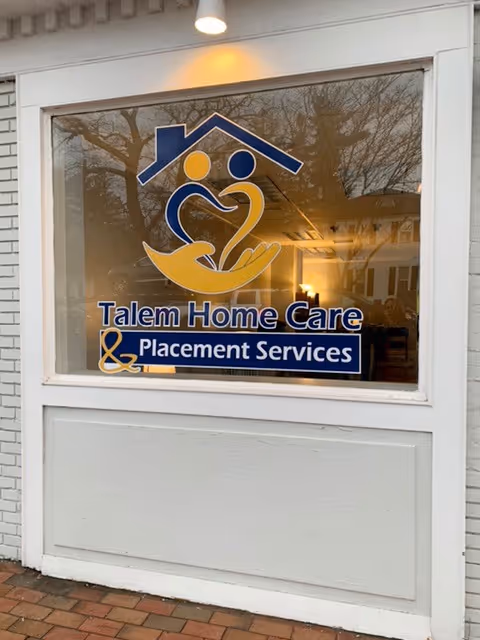 Exterior window sign for Talem Home Care & Placement Services in Hartford
