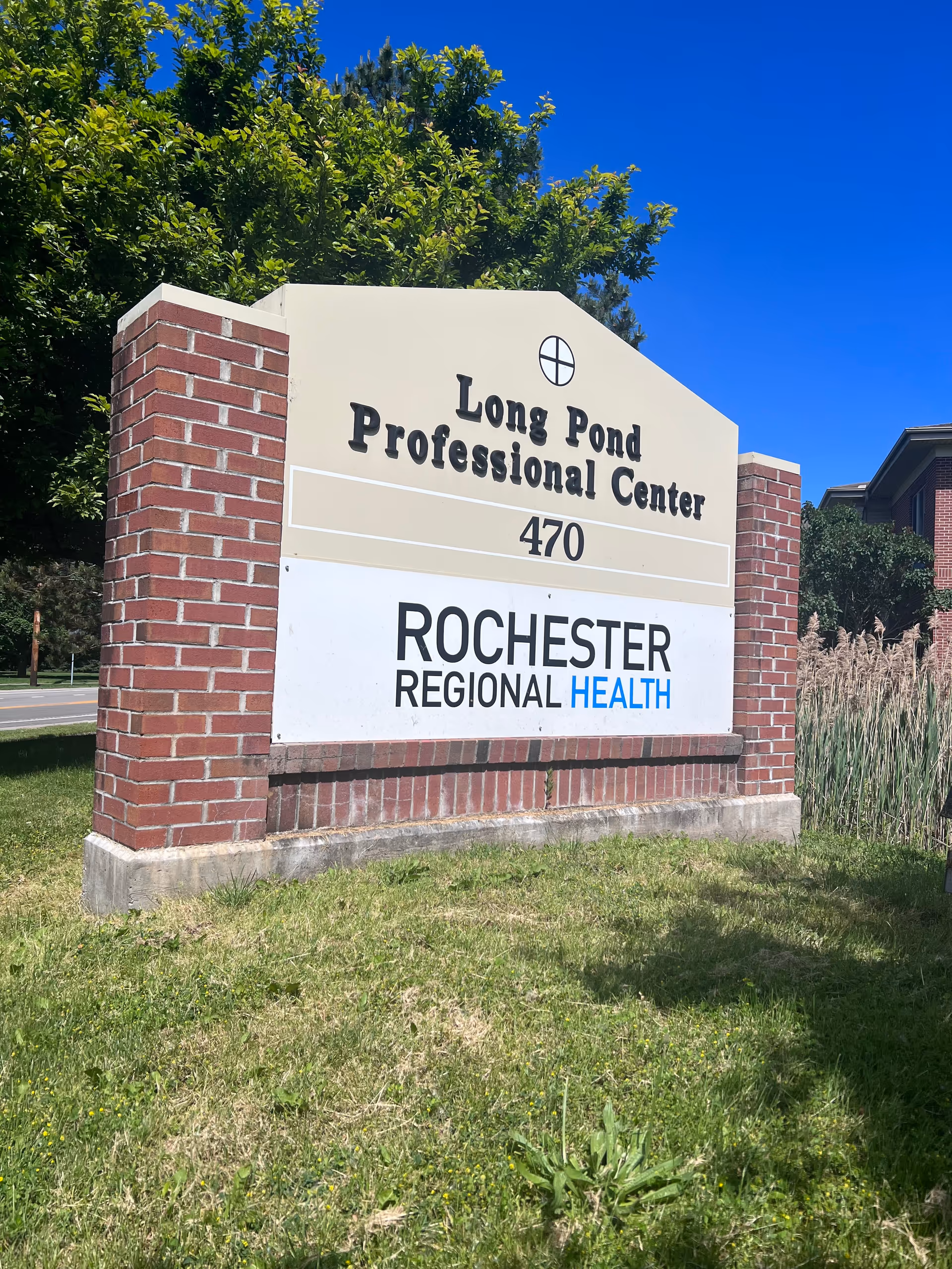 Exterior brick sign for Long Pond Professional Center and Rochester Regional Health.