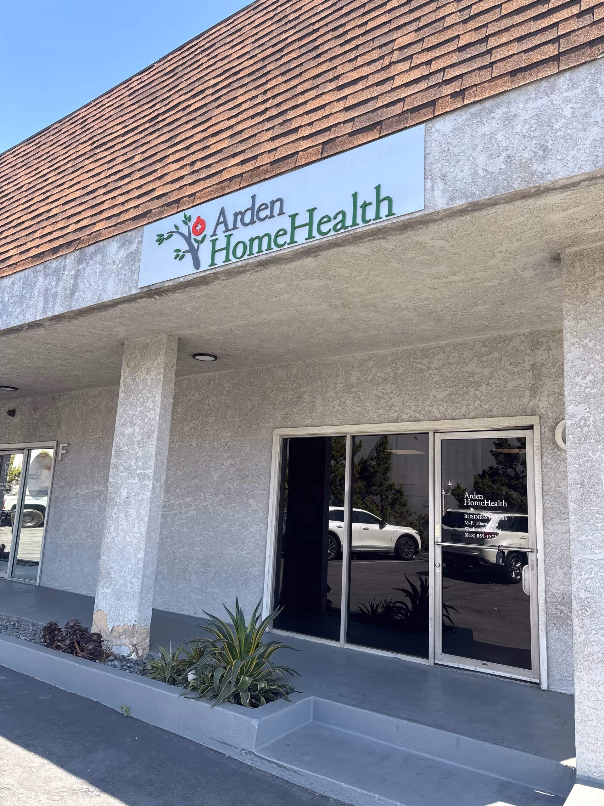 Facade of Arden Home Health with signage and glass entrance door.