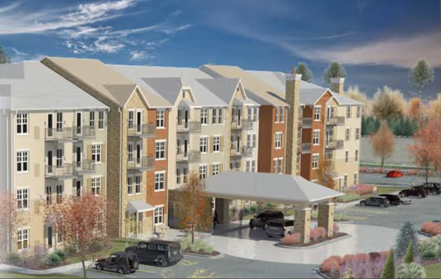 Exterior rendering of Wood Living Center of Cuero, a multi-story senior living building with entrance.