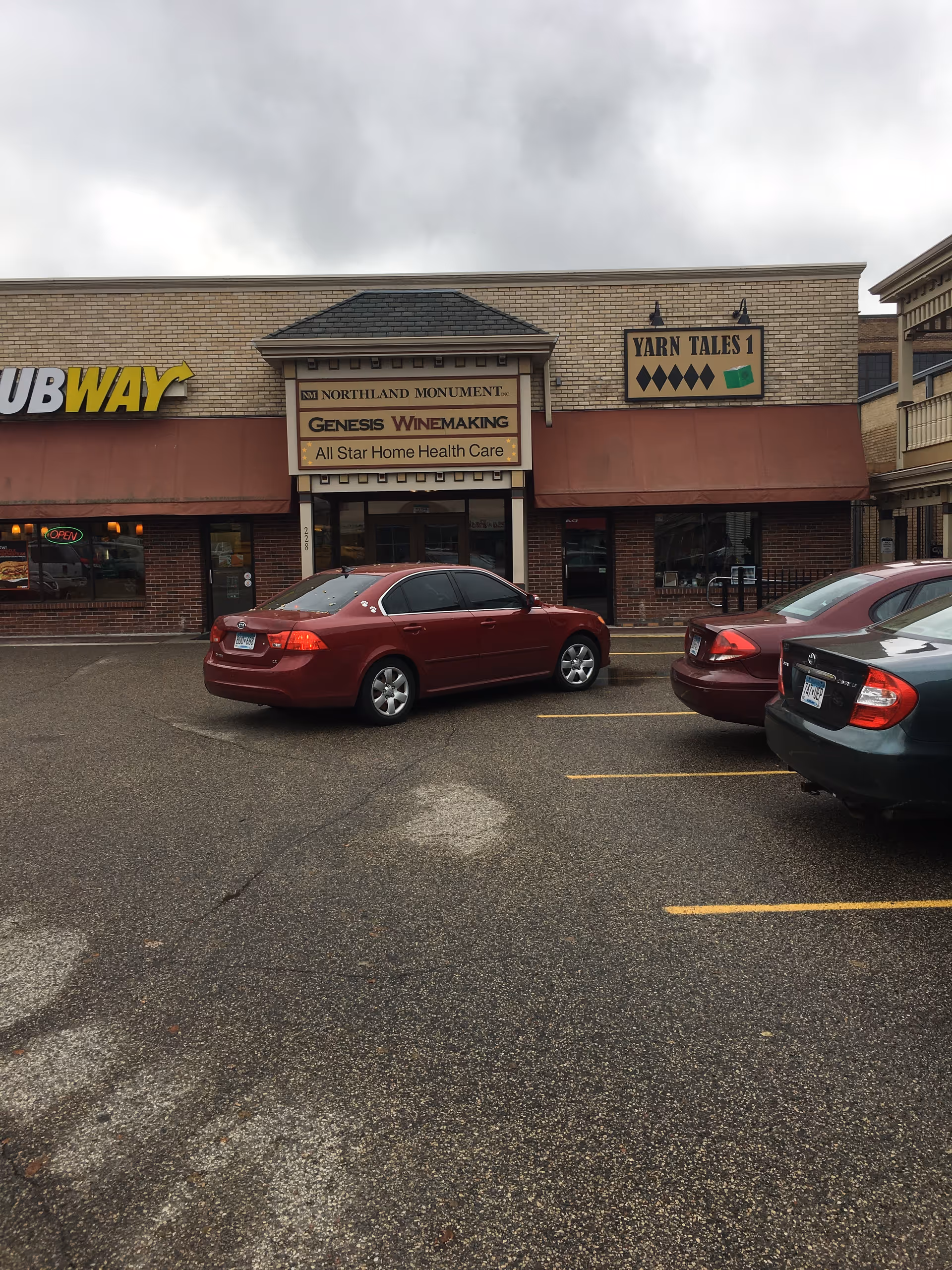 Strip mall storefronts featuring a center sign for All Star Home Health Care.
