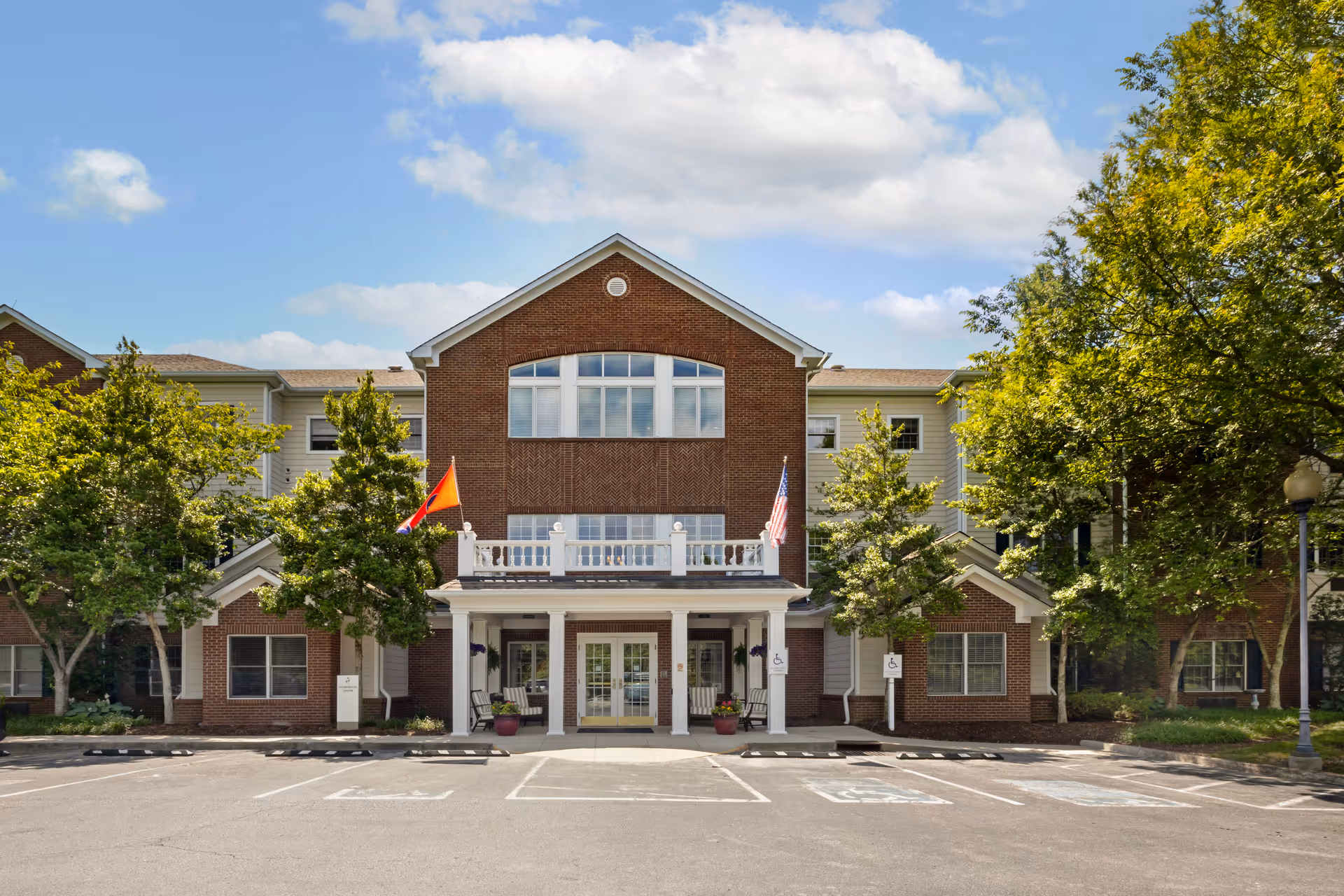 Front view of Brookdale Belle Meade senior living building with entrance and parking.