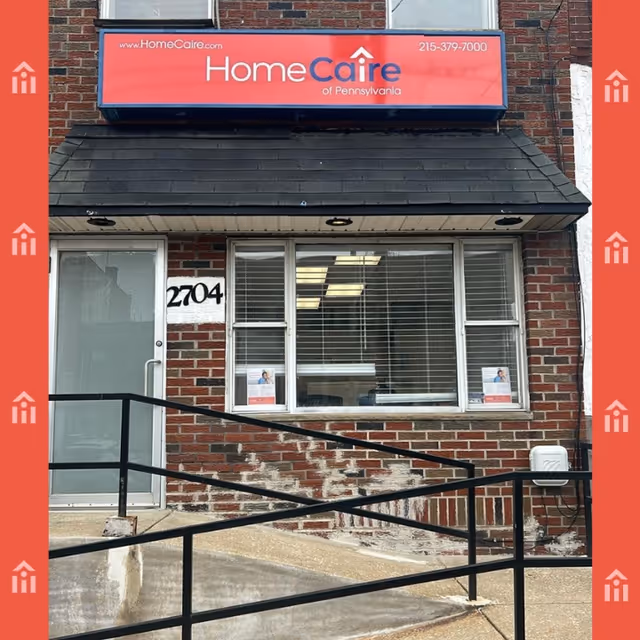 Brick storefront with HomeCare of Pennsylvania sign, windows, and a wheelchair ramp