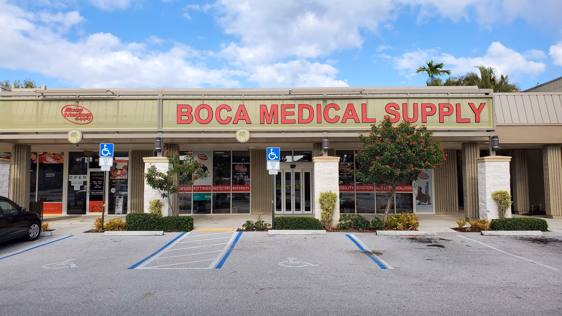 Front view of Boca Medical Supply at Palmetto Park Square with parking lot