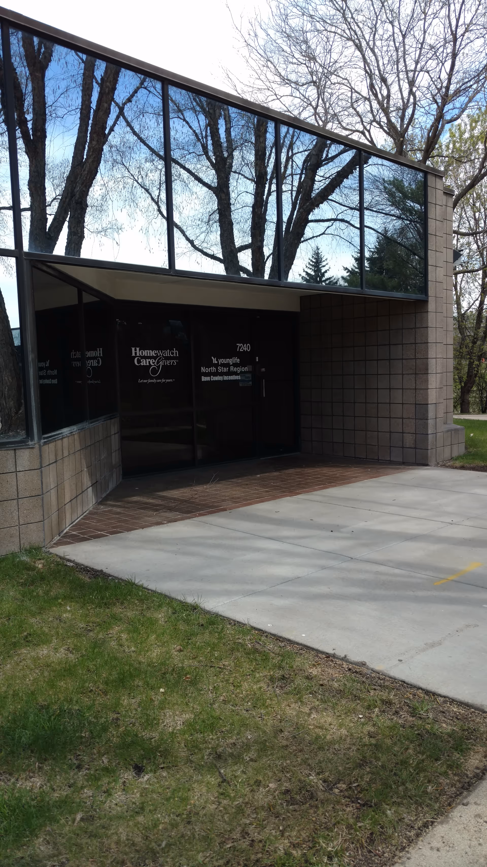 Front entrance of Homewatch CareGivers of Edina with glass doors.