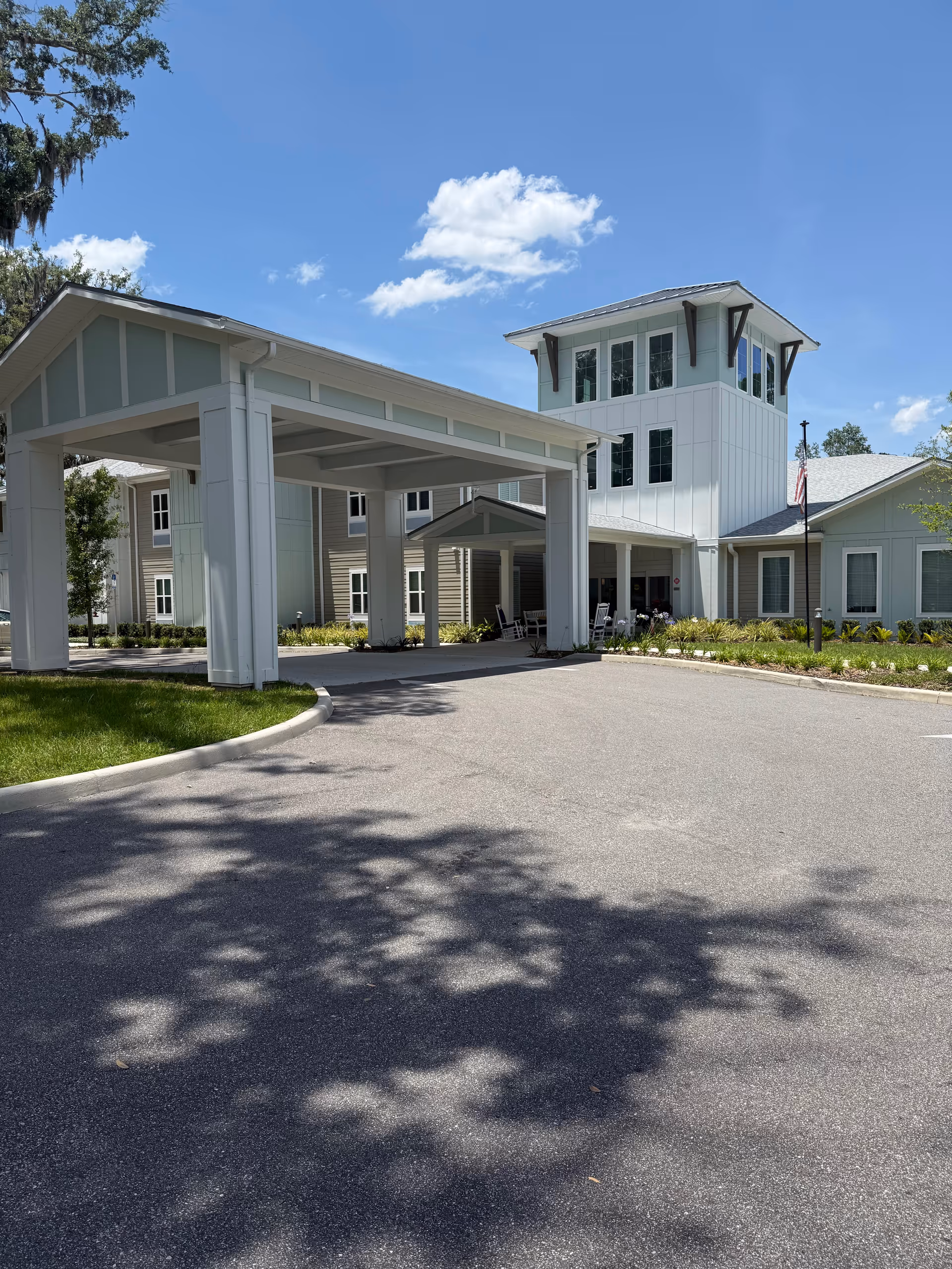 Front view of The Canopy at Duval Station with a covered entrance and tower.