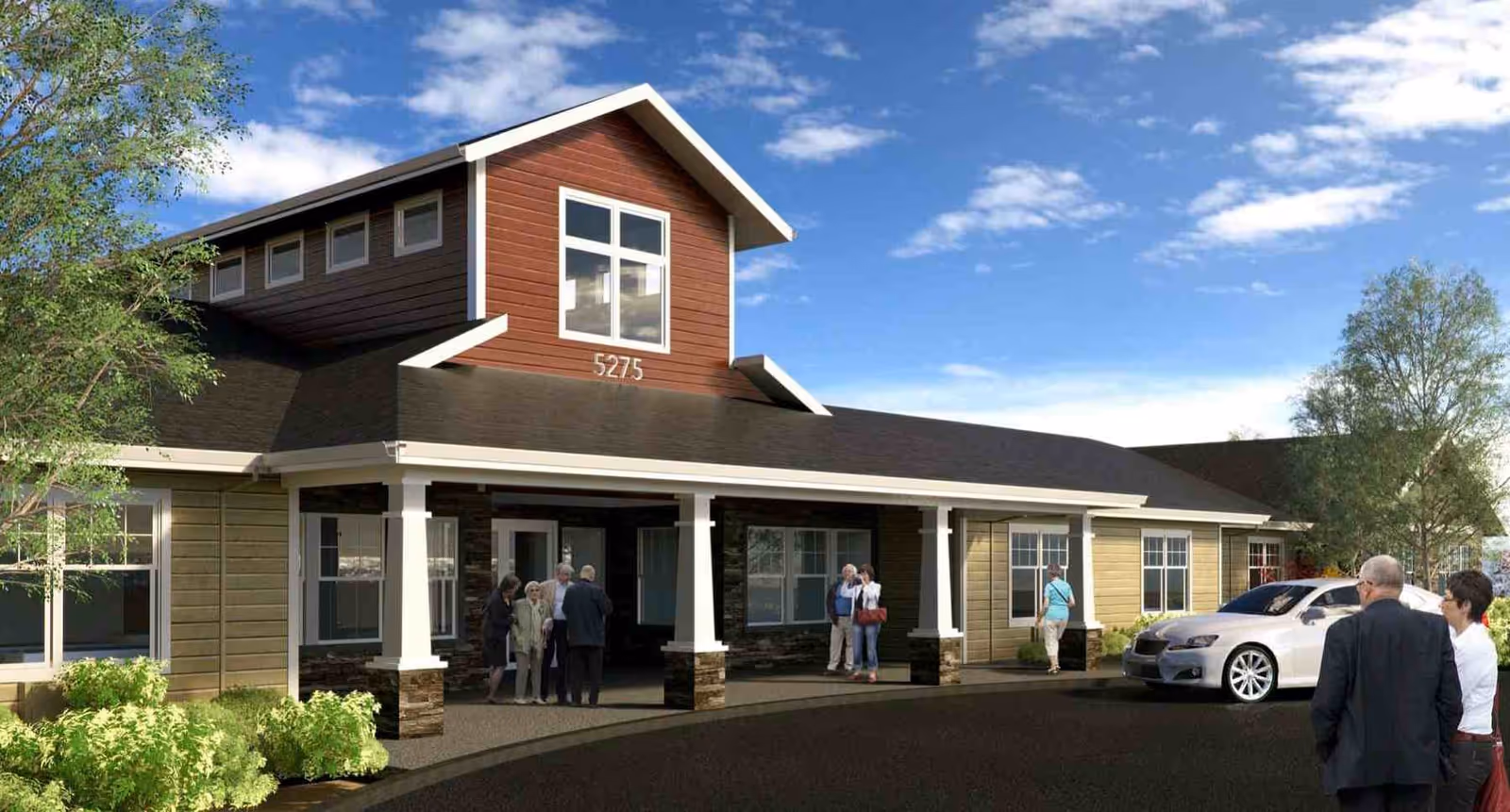 Exterior view of Willowbrook Place entrance with a group of people near the doorway.