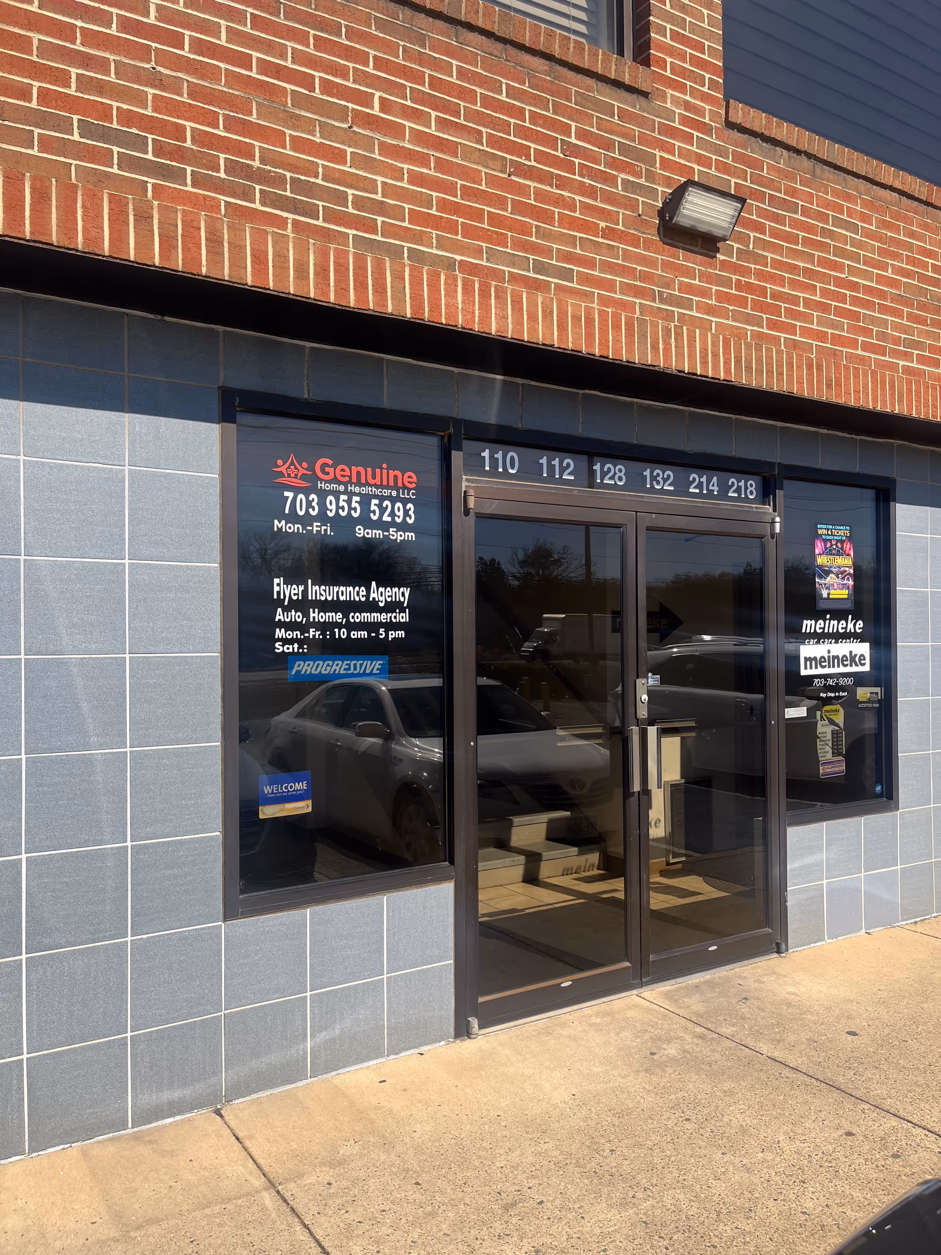 Brick storefront with glass doors displaying Genuine Home Healthcare LLC signage