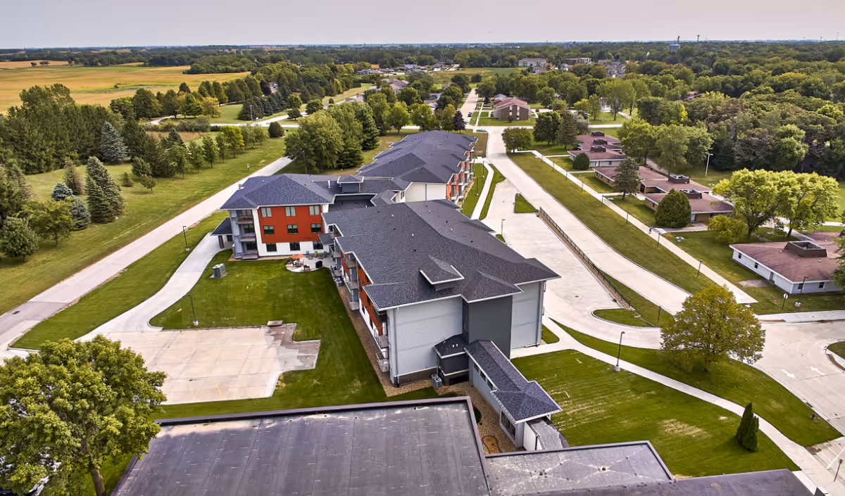 Aerial view of TimberCrest at Glen Oaks senior living campus with connected buildings.