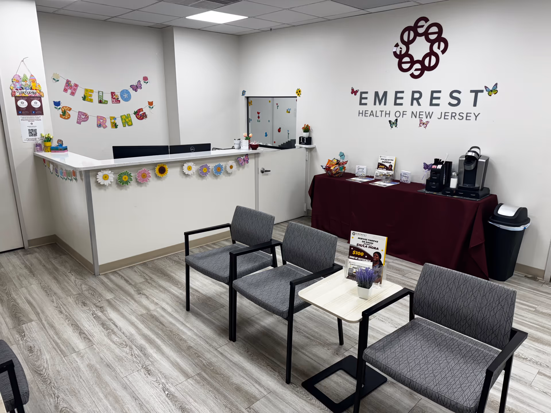 Reception area of Emerest Health of New Jersey Home Health Agency with seating
