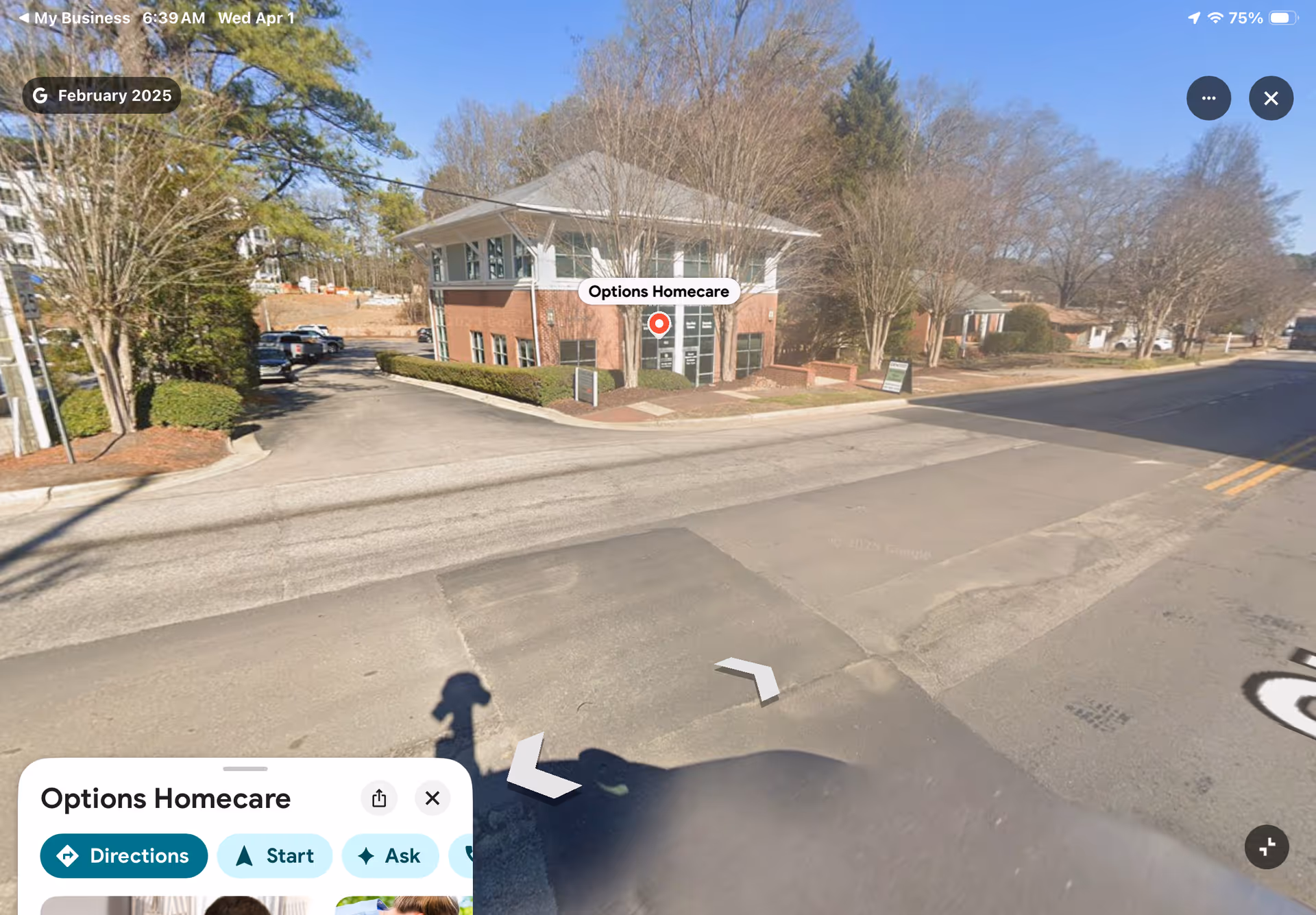 Front exterior of Options Homecare building along a tree-lined street.