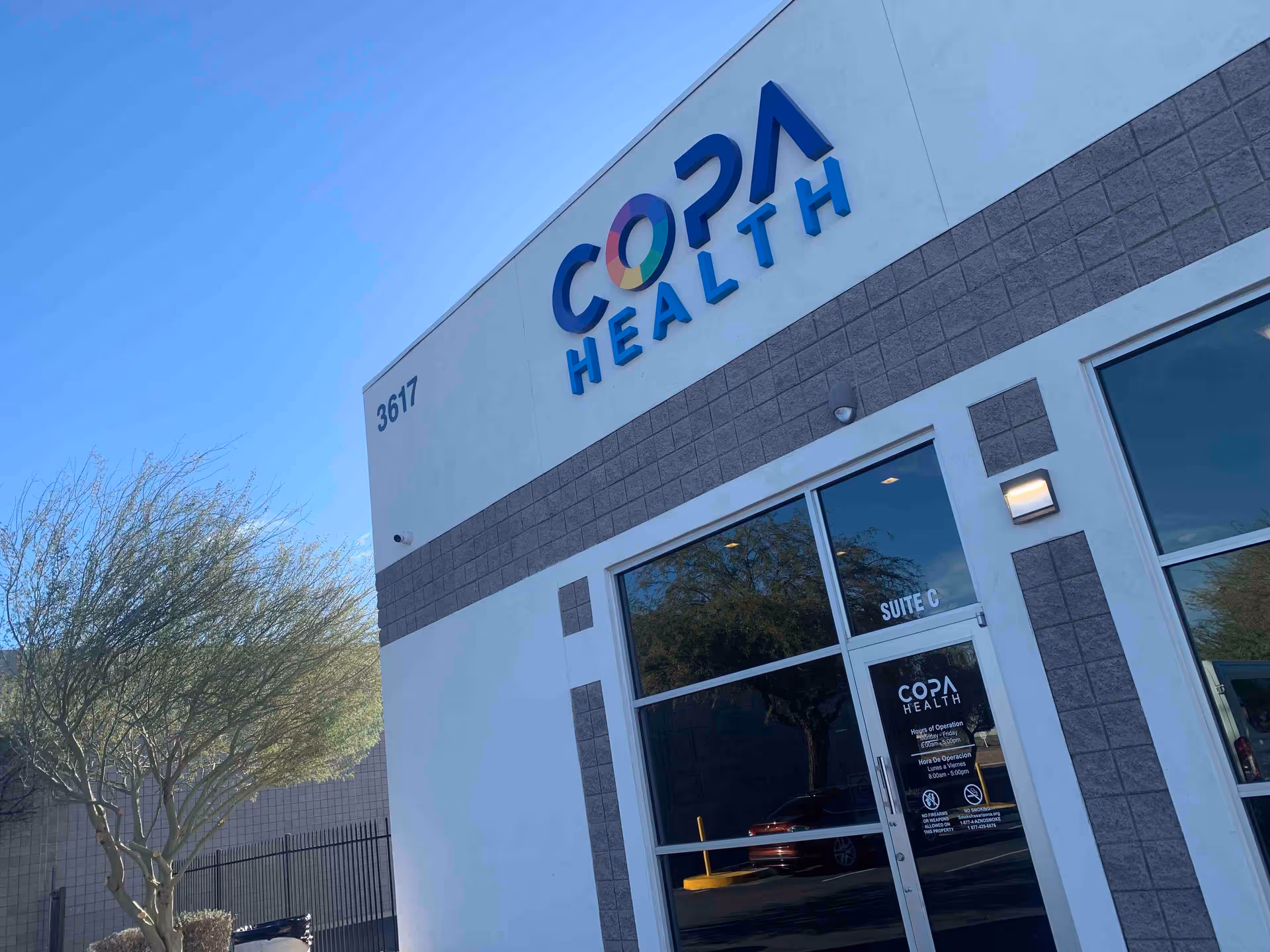 Front exterior of Copa Health Cambridge Campus with large sign on the facade.