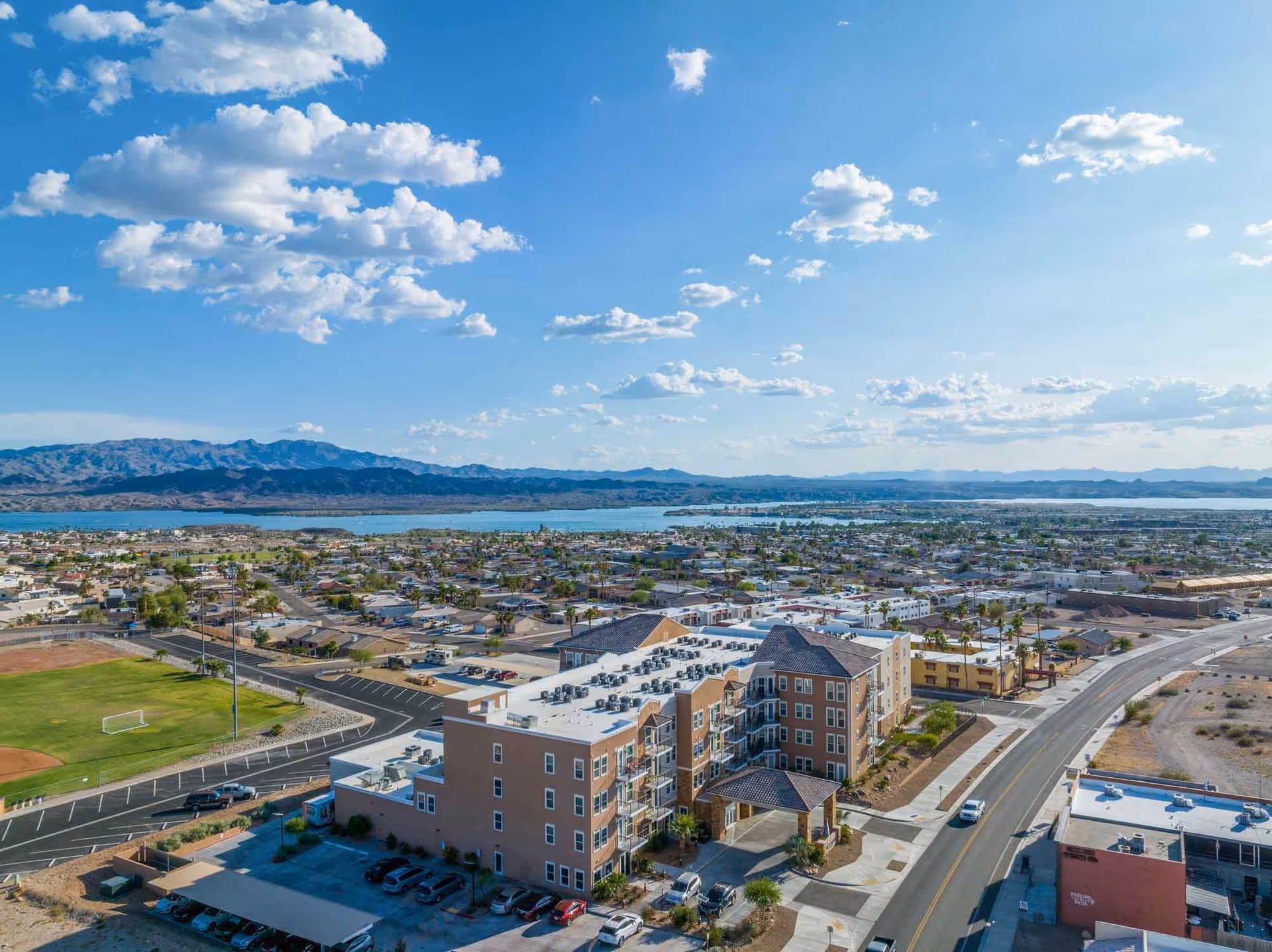 Aerial view of The Views at Lake Havasu Independent Living building and surrounding town.