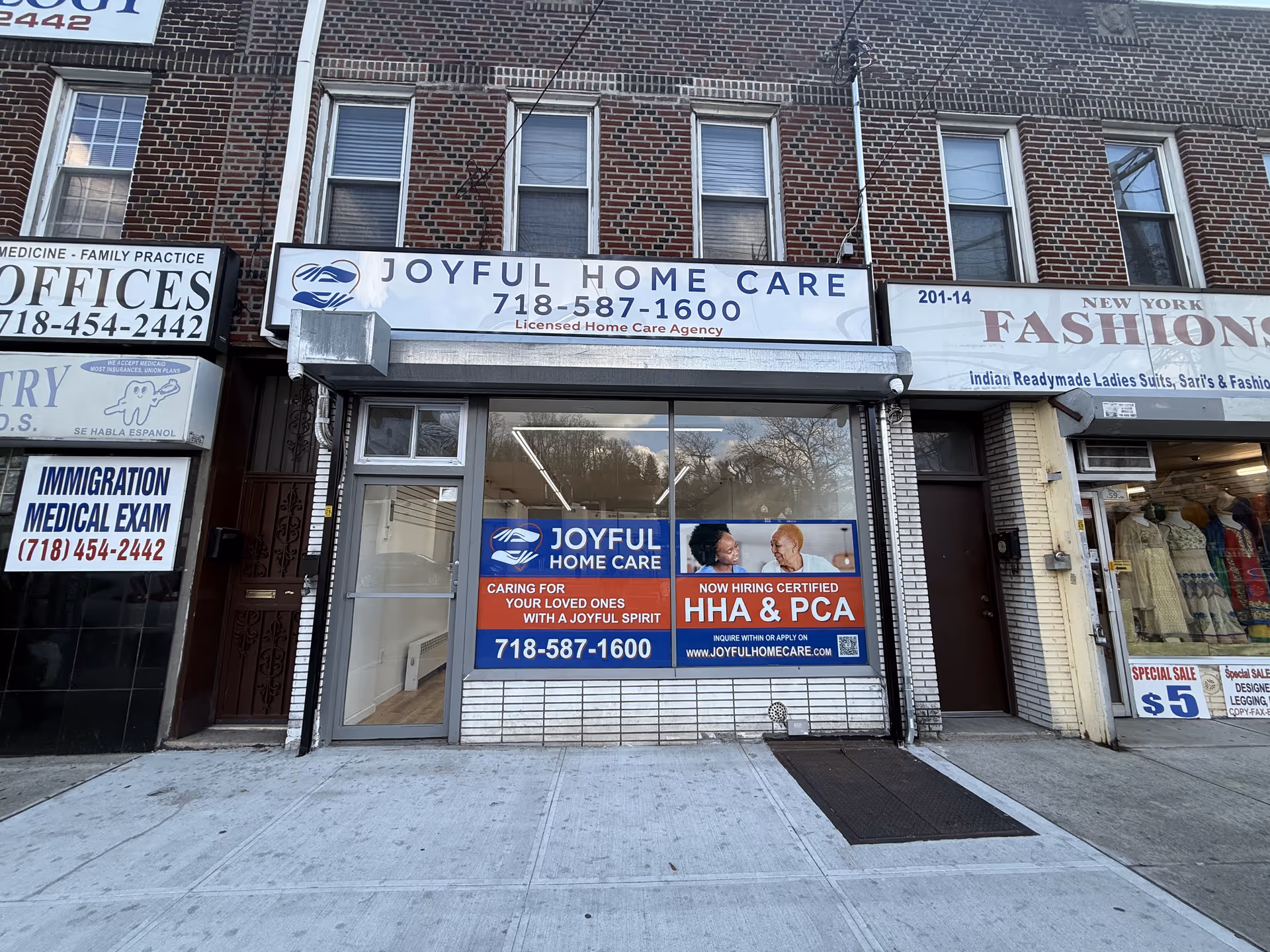 Joyful Home Care storefront on a city street with signage and windows