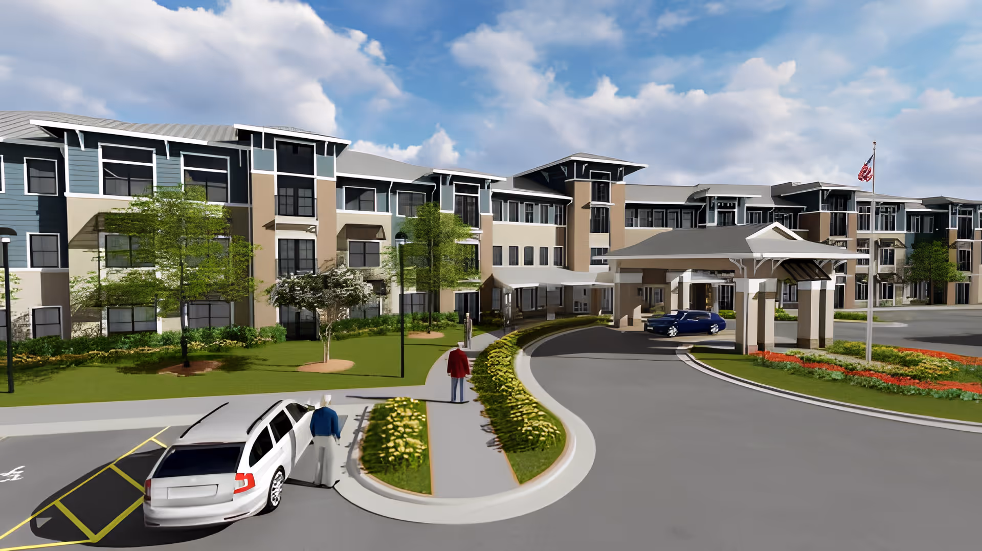 Exterior view of The Gables of Jacksonville senior living facility showing a large, modern three-story building with multiple windows, a covered entrance with a driveway, landscaped greenery, and two cars parked near the entrance. Two people are walking on the sidewalk leading to the entrance. The sky is partly cloudy.