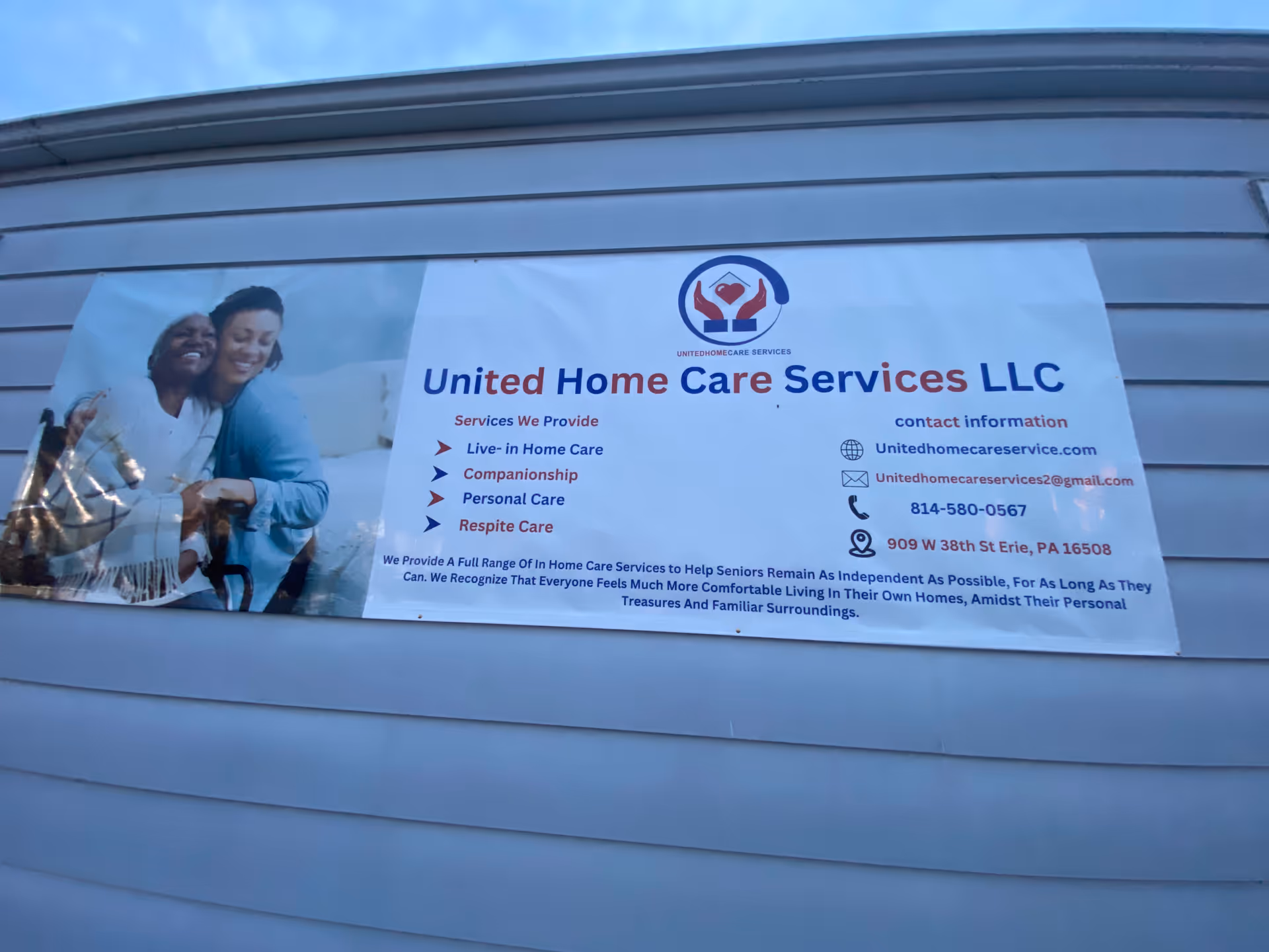 Exterior wall with a large banner advertising United Home Care Services LLC