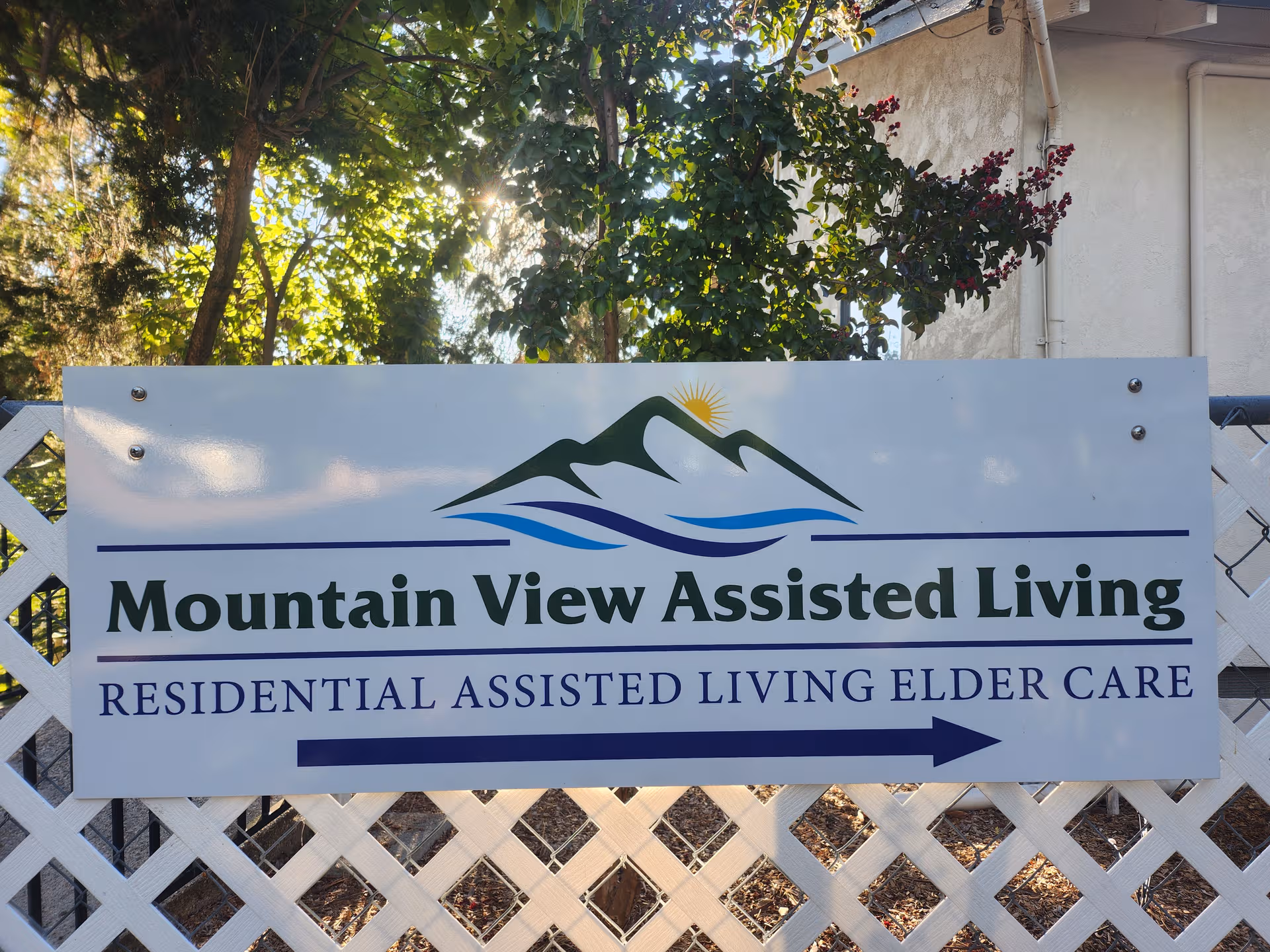 Large sign reads Mountain View Assisted Living with a mountain logo and arrow beneath.