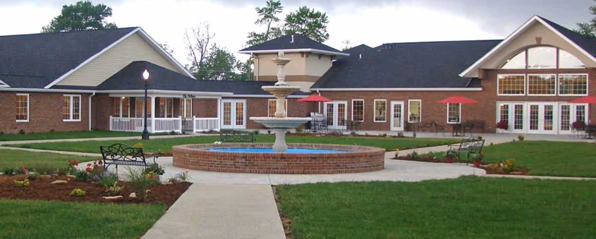 Exterior view of Pleasant Grove Home outdoor courtyard with fountain.
