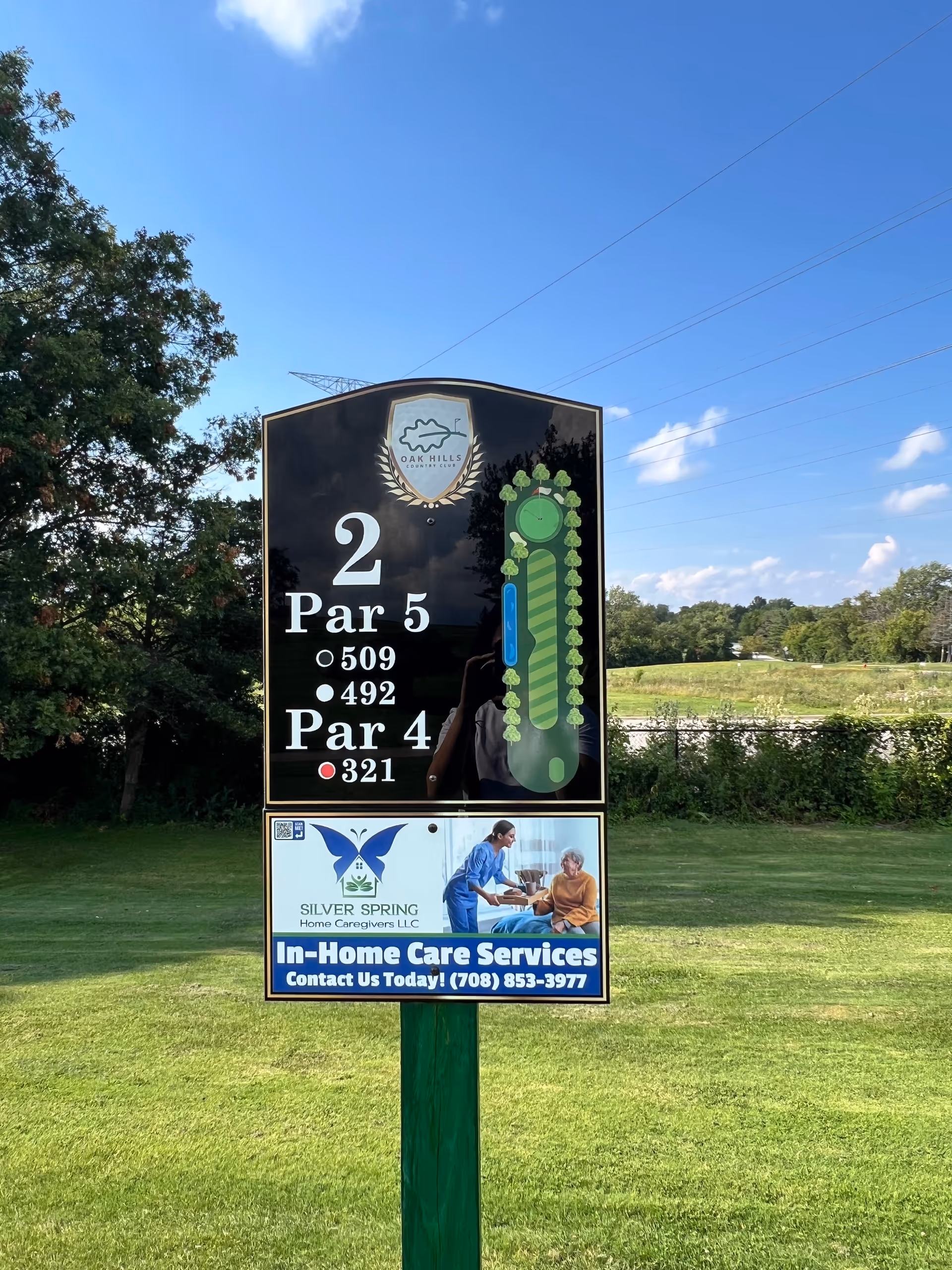 Outdoor advertising sign for Silver Spring Home Caregivers LLC on a grassy field