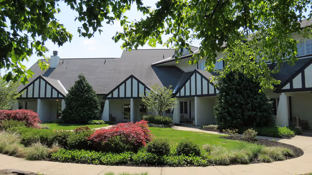 Exterior view of Concordia Hospice of Washington Donnell House with landscaped garden and entryway.