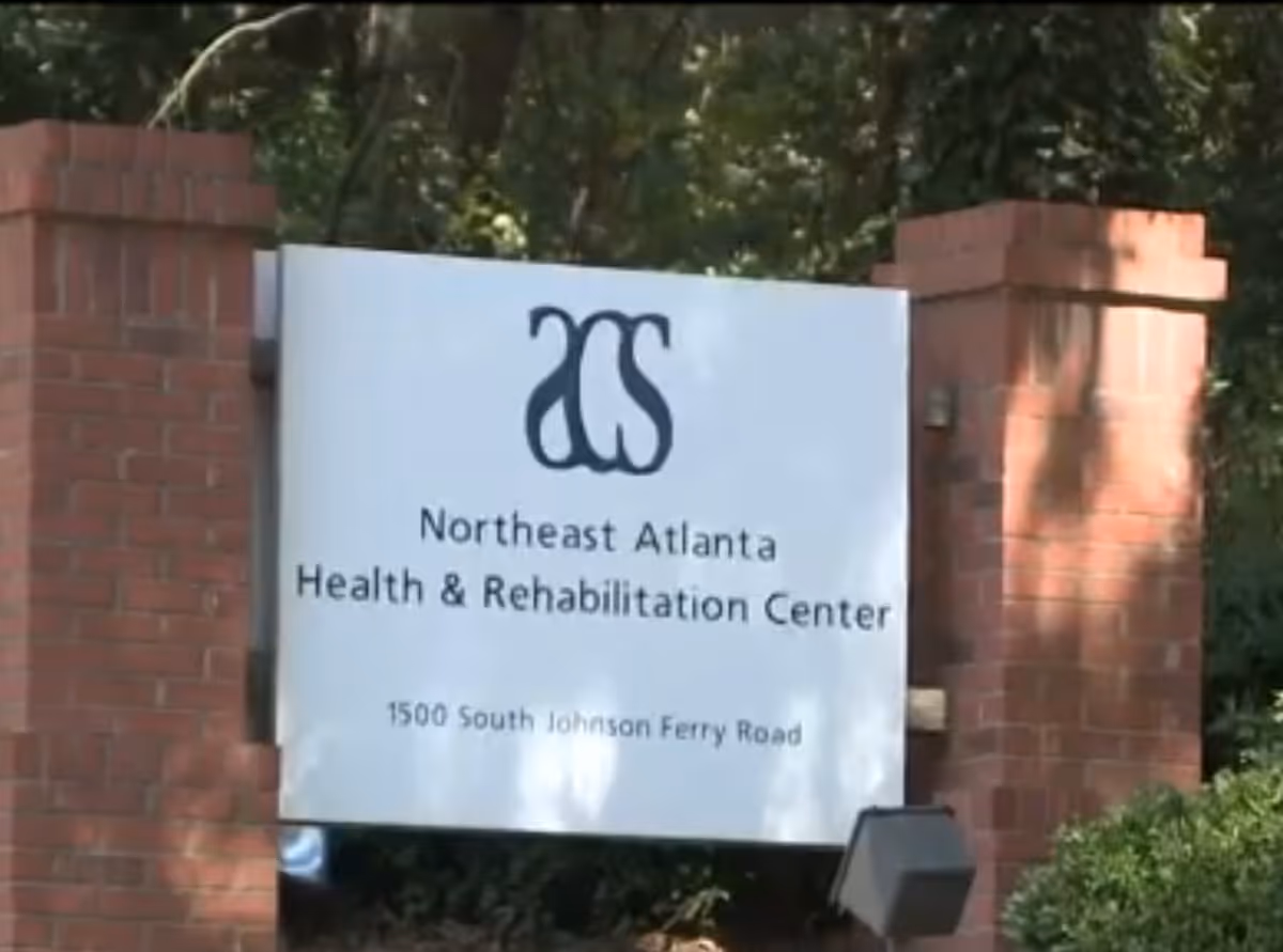 Brick entrance with a white sign reading Northeast Atlanta Health & Rehabilitation Center