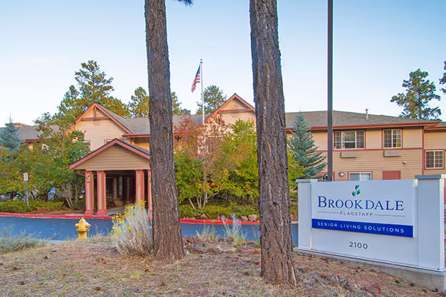 Brookdale Flagstaff senior living facility exterior with entrance and signage.