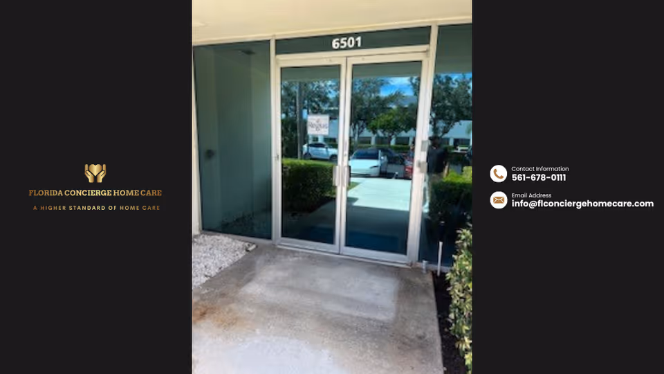 Glass entrance door with branding of Florida Concierge Home Care and reflected parking.