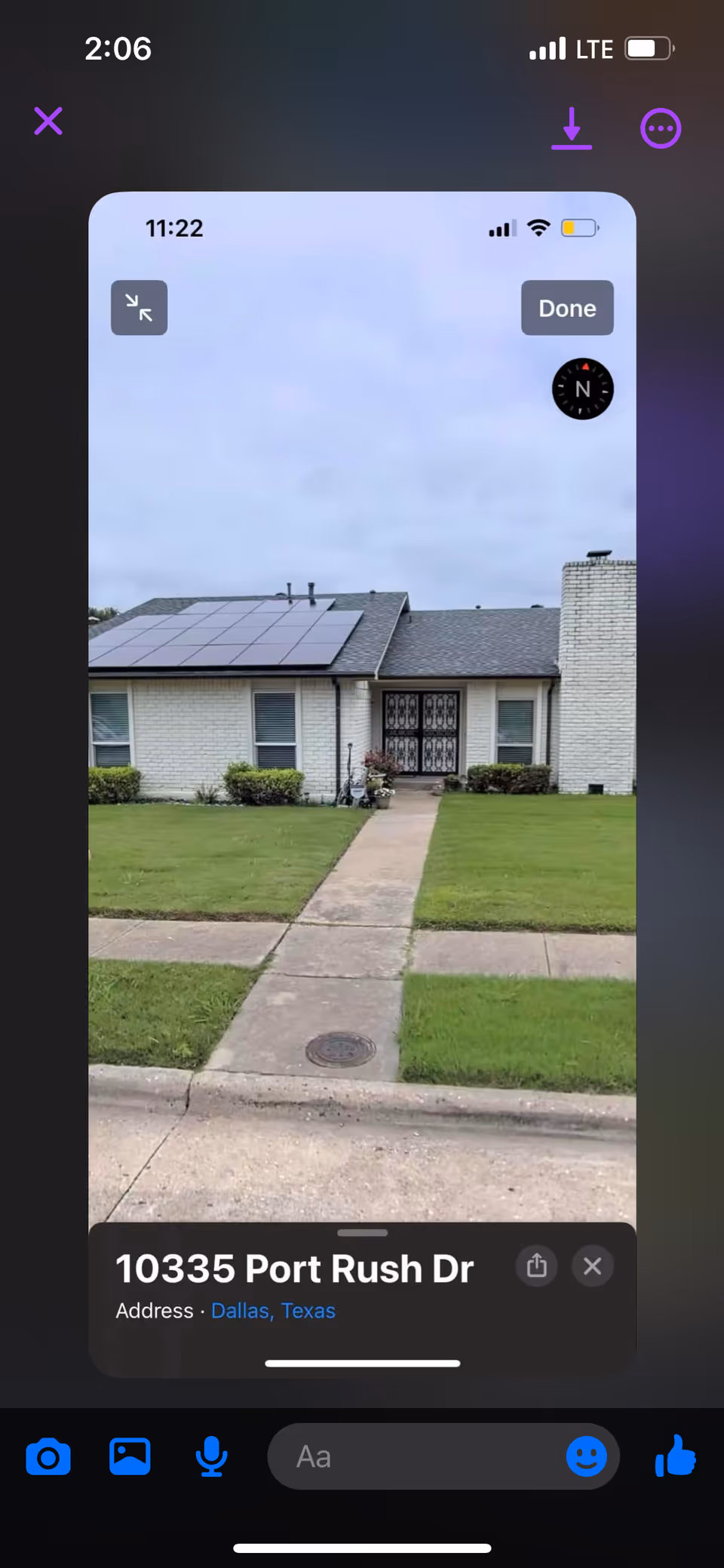 Front exterior of a single-story residential care home with a walkway and solar panels