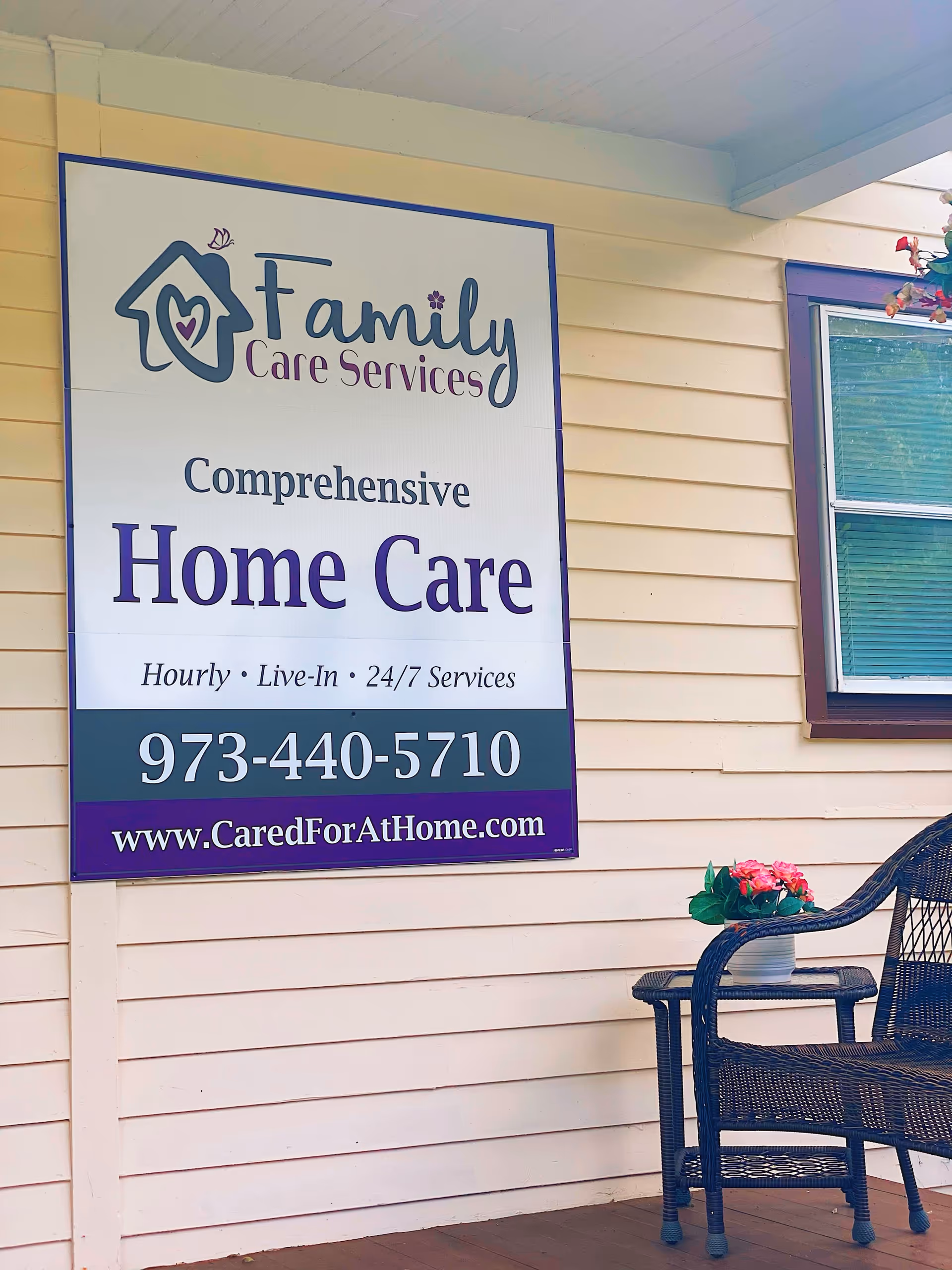 Exterior of a house-style facility with a large Family Care Services sign and porch seating.